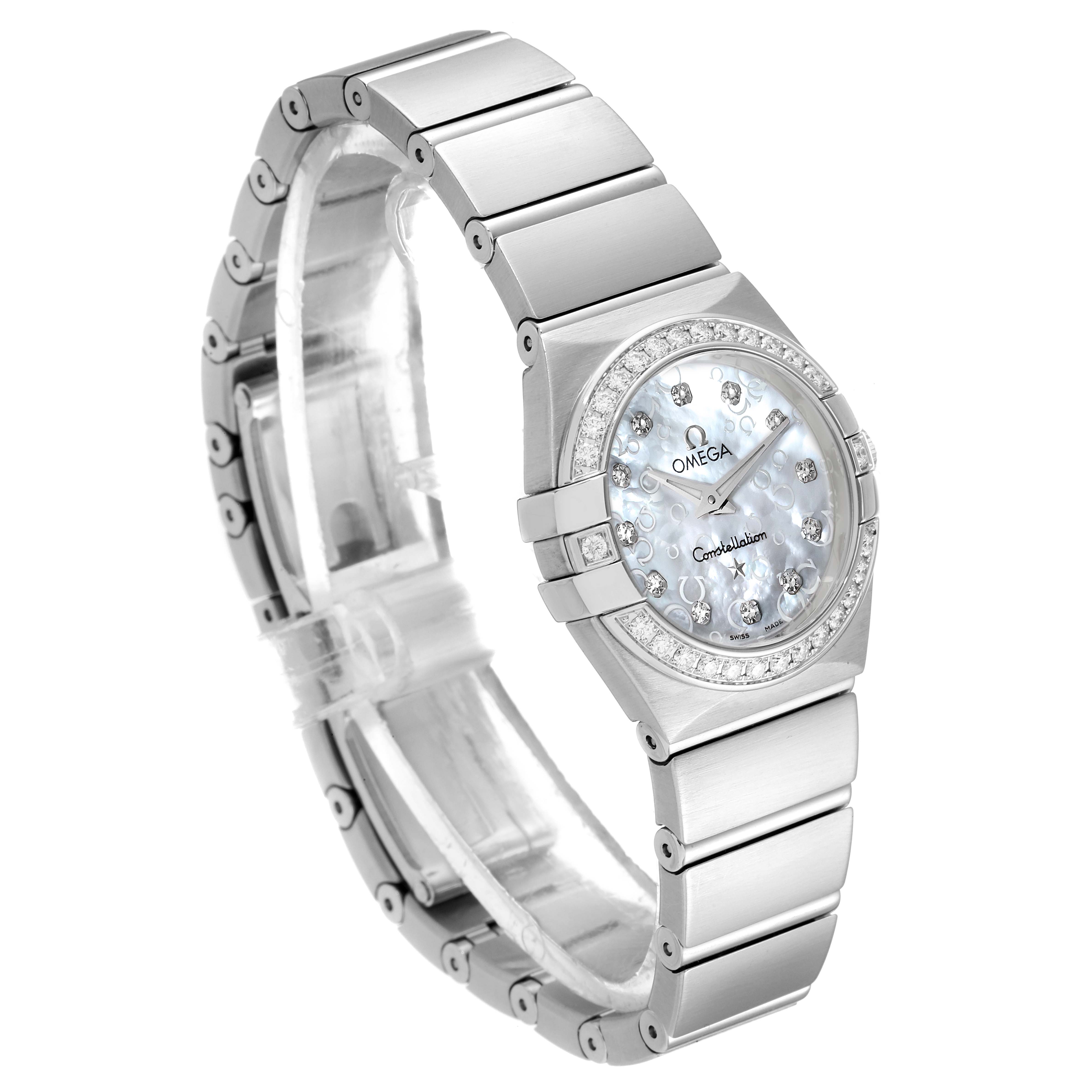 The image shows an angled view of an Omega 123.15.24.60.55.005 Women's Stainless Steel Mother of Pearl Dial 123.15.24.60.55.005 Women's Stainless Steel Mother of Pearl Dial Constellation 24mm MOP Diamond Watch 123.15.24.60.55.005 with its bracelet and face visible.