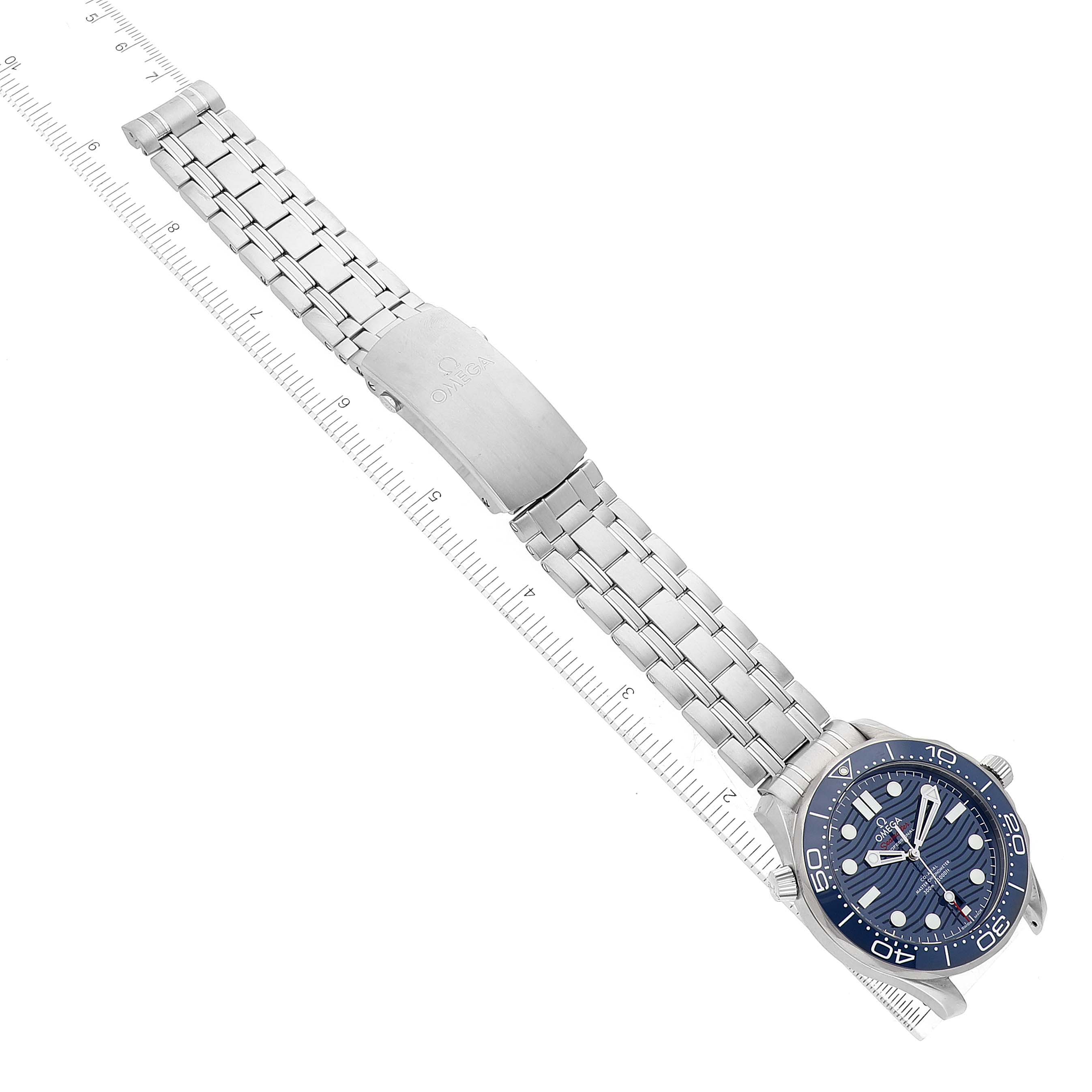 The image shows a top view of an Omega Seamaster 210.30.42.20.03.001 Men's Stainless Steel Blue Dial 210.30.42.20.03.001 Men's Stainless Steel Blue Dial watch with a silver metal bracelet and a blue dial.