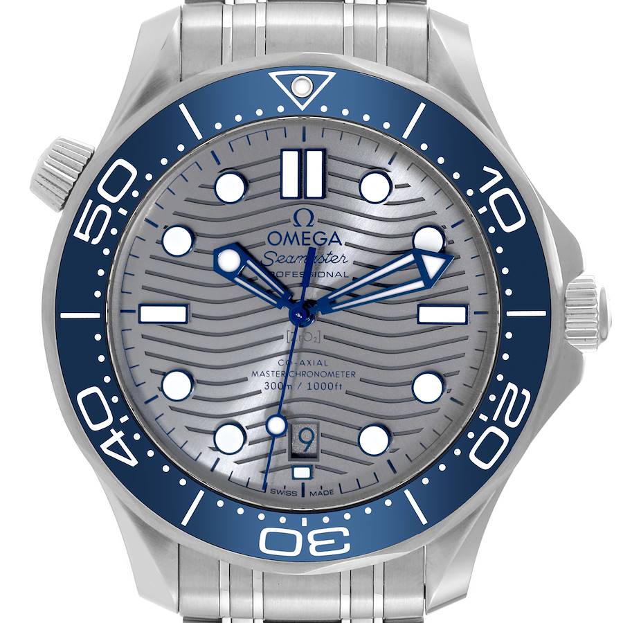 The Omega Seamaster watch is shown from a frontal angle, displaying the dial, bezel, and part of the bracelet.