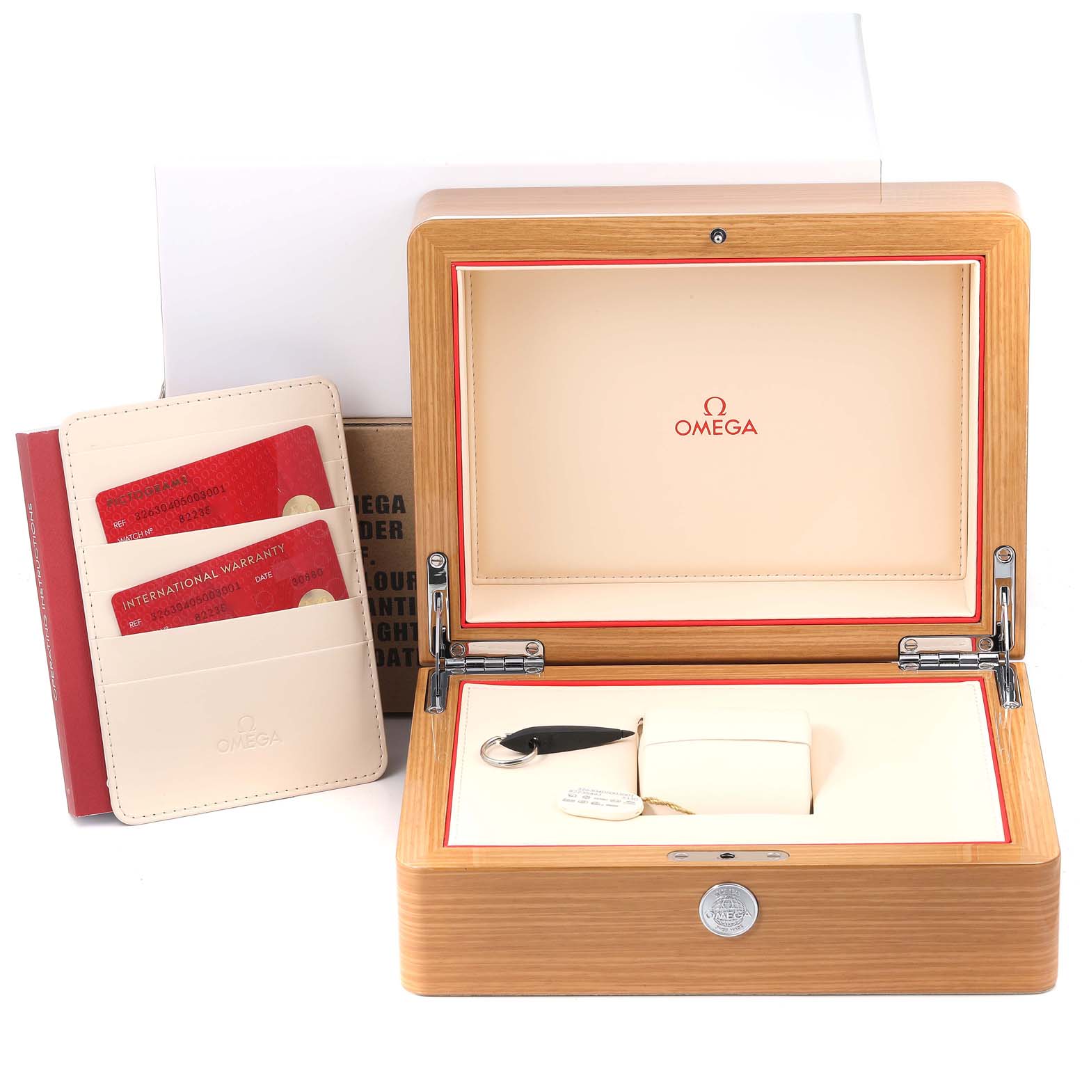 The image shows an open Omega Speedmaster 326.30.40.50.03.001 Men's Stainless Steel Blue Dial 326.30.40.50.03.001 Men's Stainless Steel Blue Dial watch box with warranty cards and accompanying accessories.