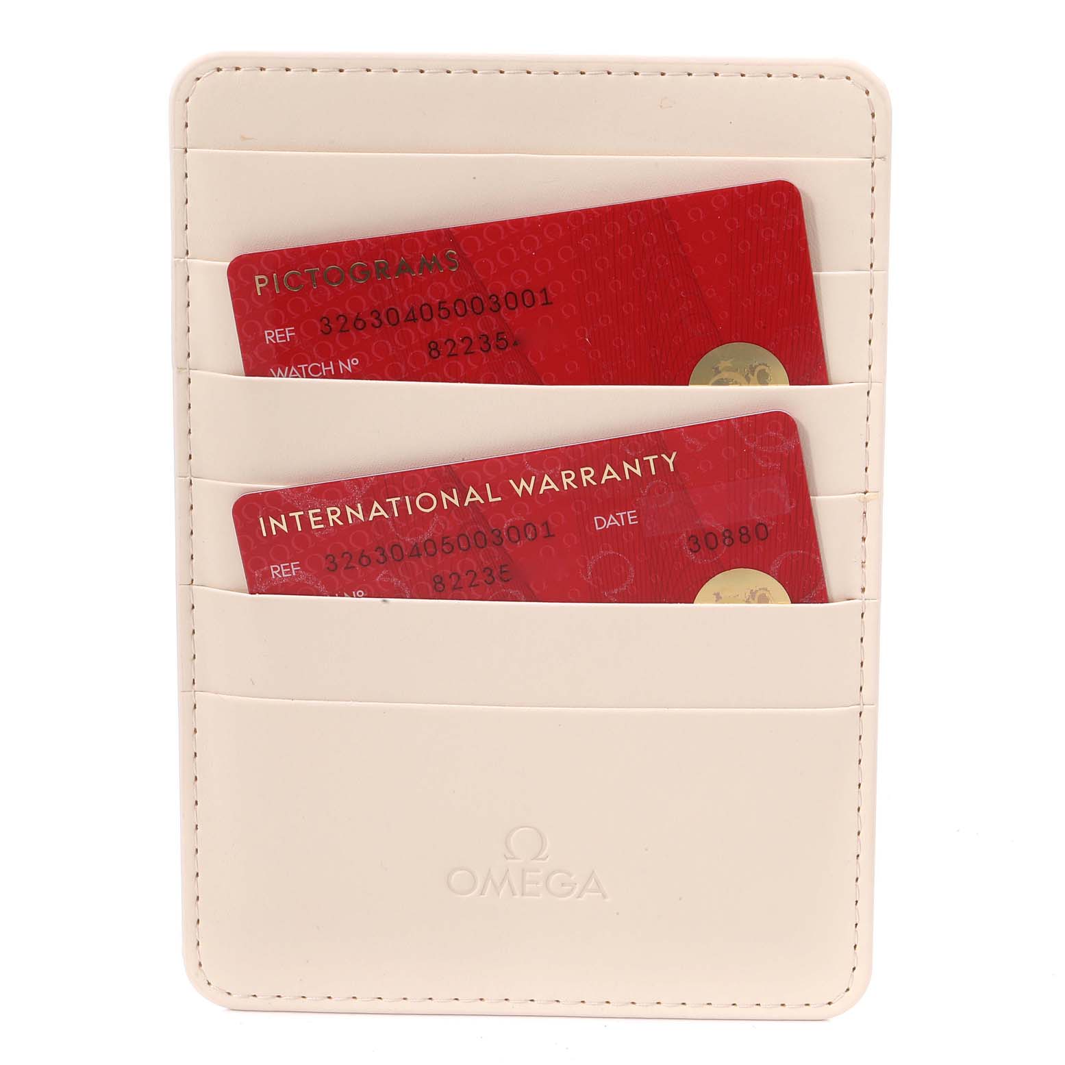 The image shows an Omega Speedmaster 326.30.40.50.03.001 Men's Stainless Steel Blue Dial 326.30.40.50.03.001 Men's Stainless Steel Blue Dial watch's warranty cards inside a branded white cardholder.