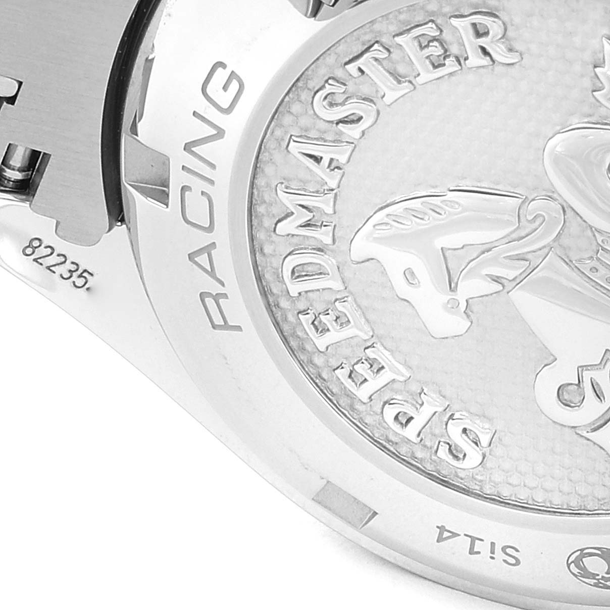 This image shows a close-up of the case back of an Omega Speedmaster 326.30.40.50.03.001 Men's Stainless Steel Blue Dial 326.30.40.50.03.001 Men's Stainless Steel Blue Dial Racing watch, featuring the logo and engraving details.