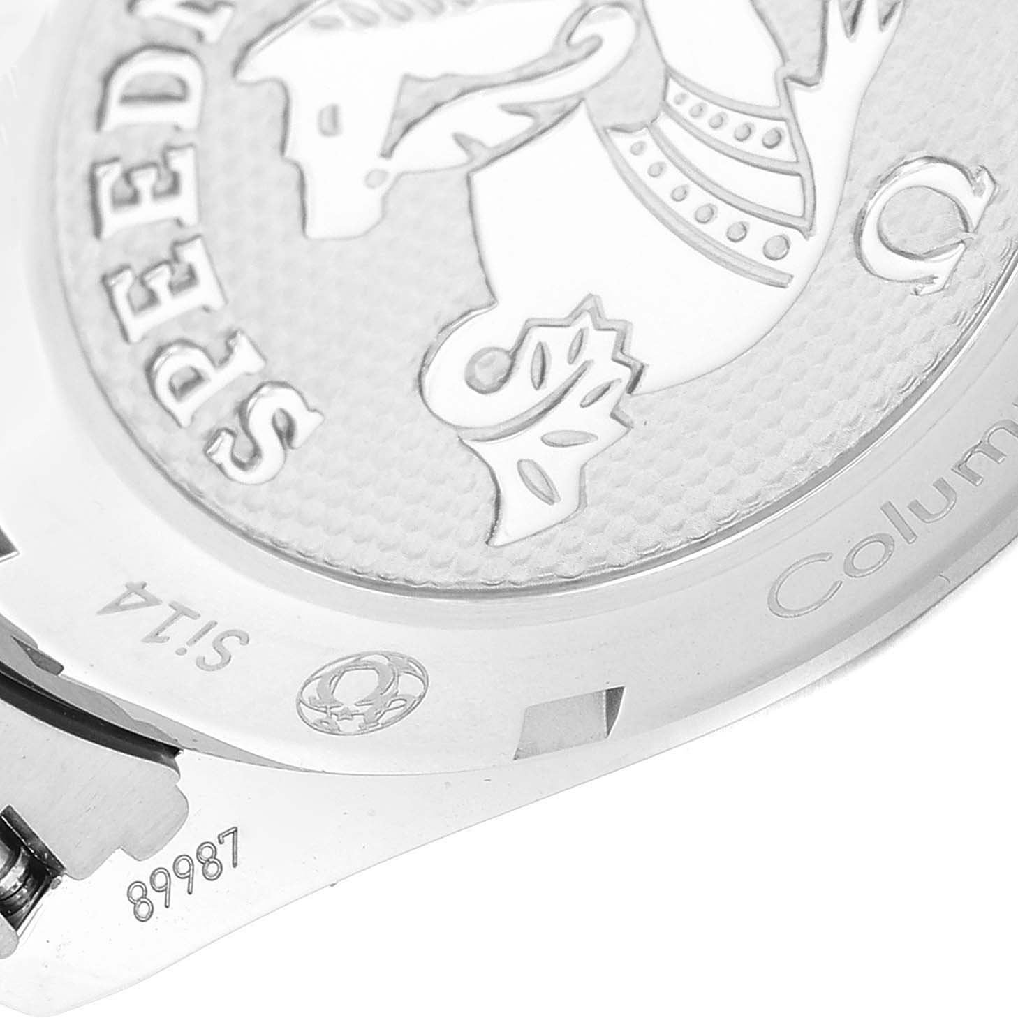 The image shows a close-up of the back cover of an Omega Speedmaster 326.30.40.50.03.001 Men's Stainless Steel Blue Dial 326.30.40.50.03.001 Men's Stainless Steel Blue Dial watch, highlighting the logo and engraving details.