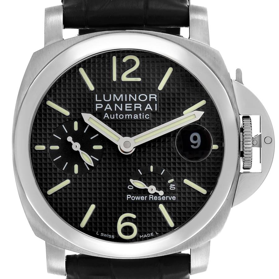 The Panerai Luminor watch is shown from a front angle, featuring the dial, crown guard, and power reserve indicator.