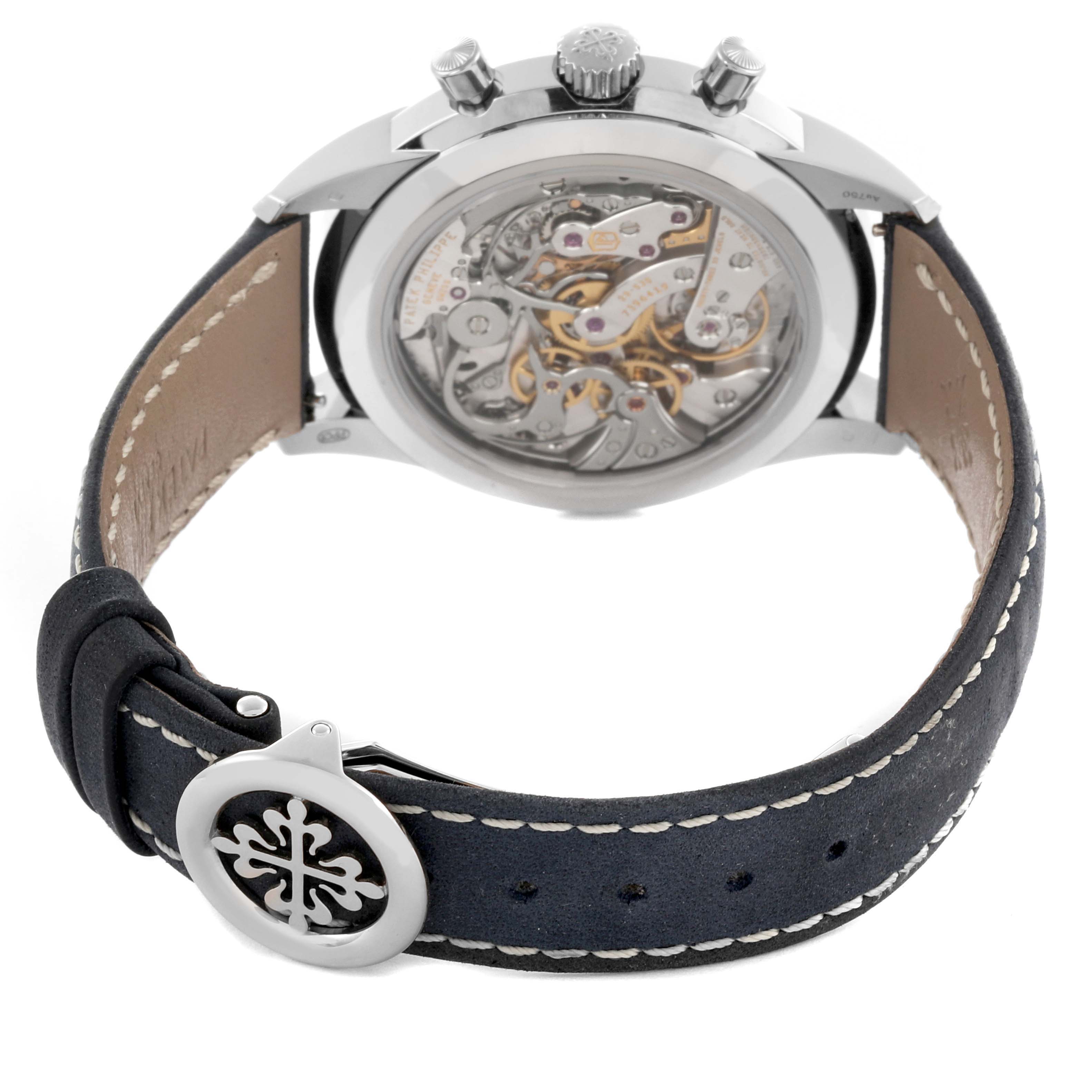 The image shows the back view of a Patek Philippe Complications 5172G-001 Men's White Gold Blue Dial 5172G-001 Men's White Gold Blue Dial watch, highlighting its intricate movement and strap.