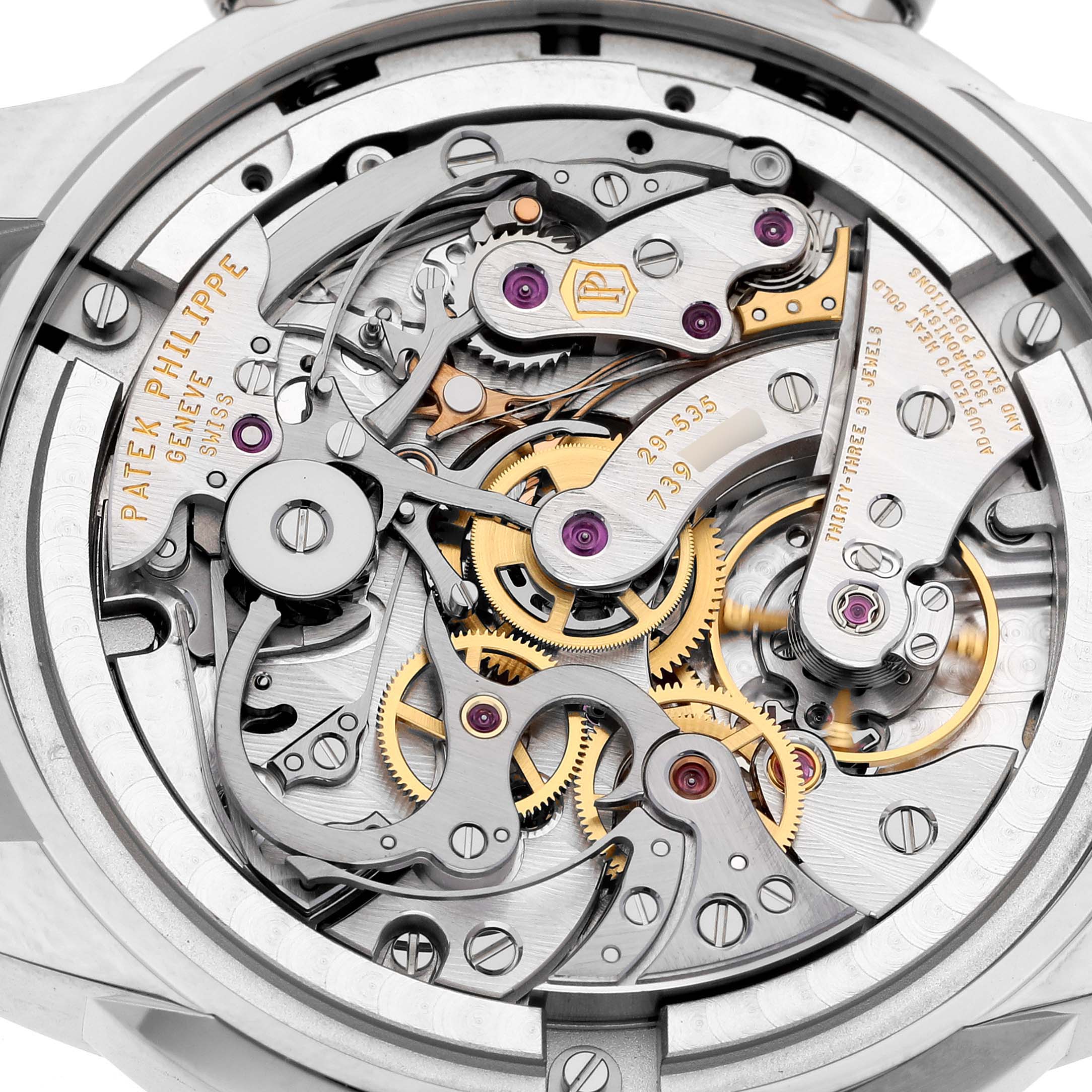 The image shows the intricate movement mechanism of a Patek Philippe Complications 5172G-001 Men's White Gold Blue Dial 5172G-001 Men's White Gold Blue Dial watch from the back.