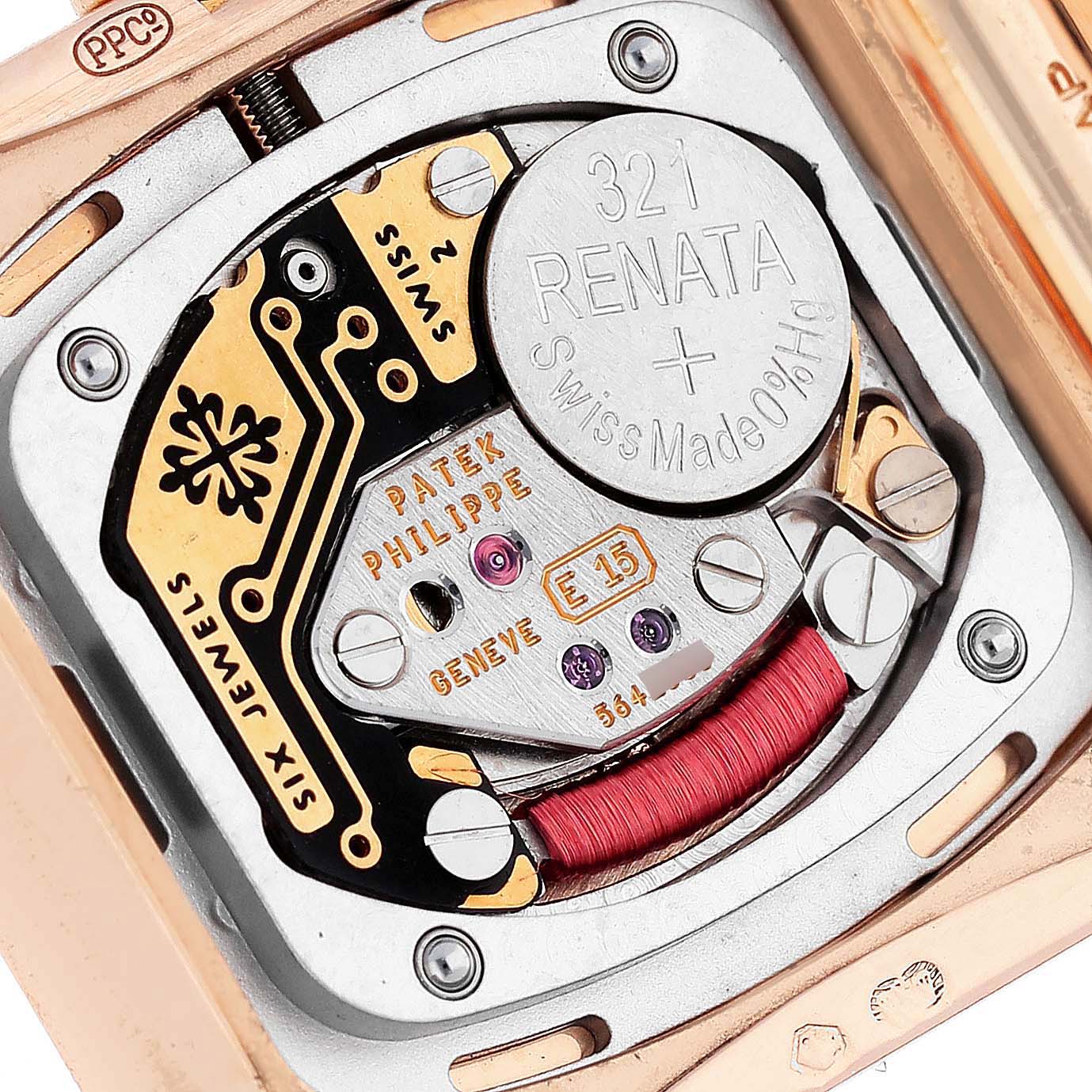 The image shows the movement mechanism of the Patek Philippe Twenty-4 4908/11R Women's Rose Gold Silver Dial 4908/11R Women's Rose Gold Silver Dial model, highlighting its internal components and inscriptions.