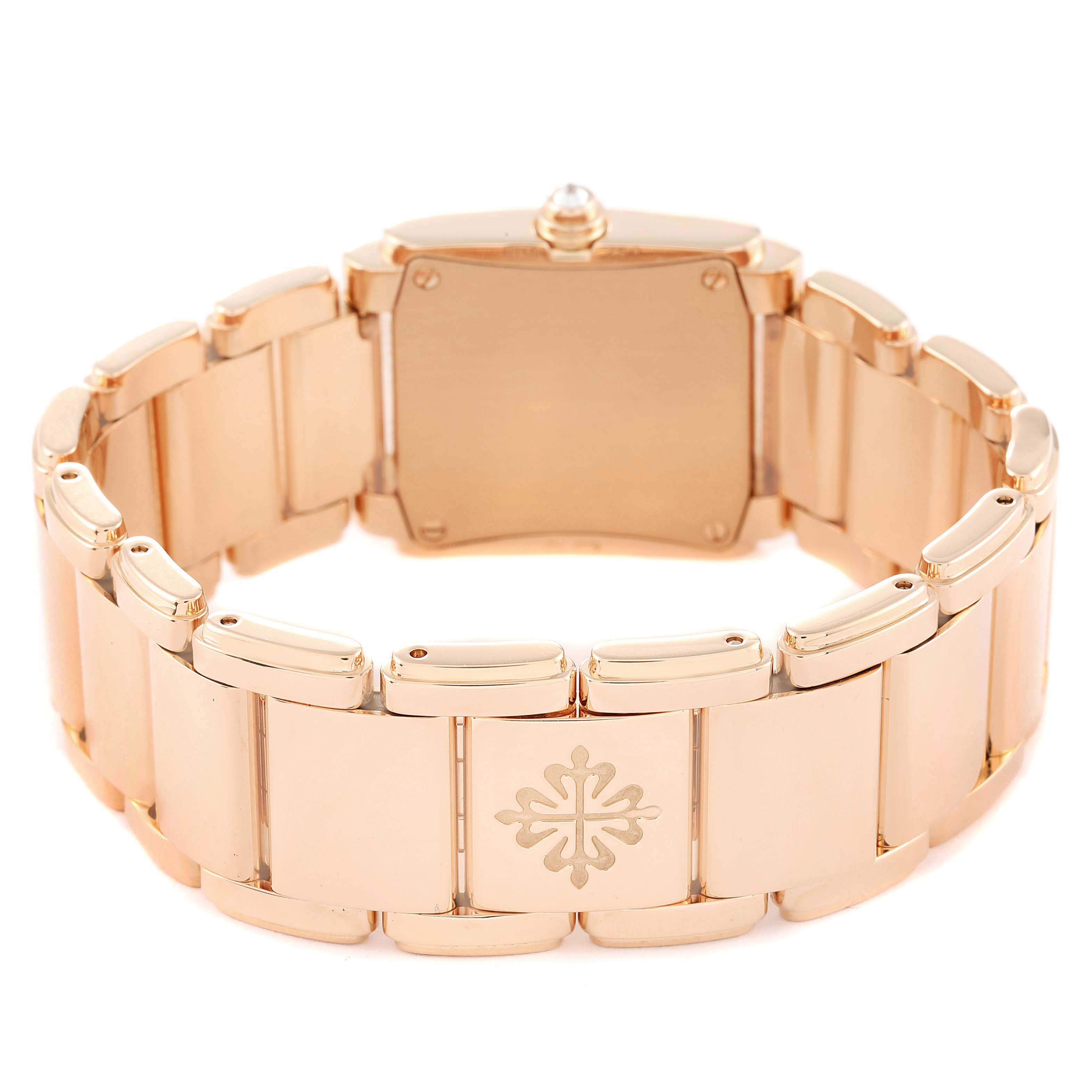 The image shows the back of a Patek Philippe Twenty-4 4908/11R Women's Rose Gold Silver Dial 4908/11R Women's Rose Gold Silver Dial watch, highlighting the clasp and band.