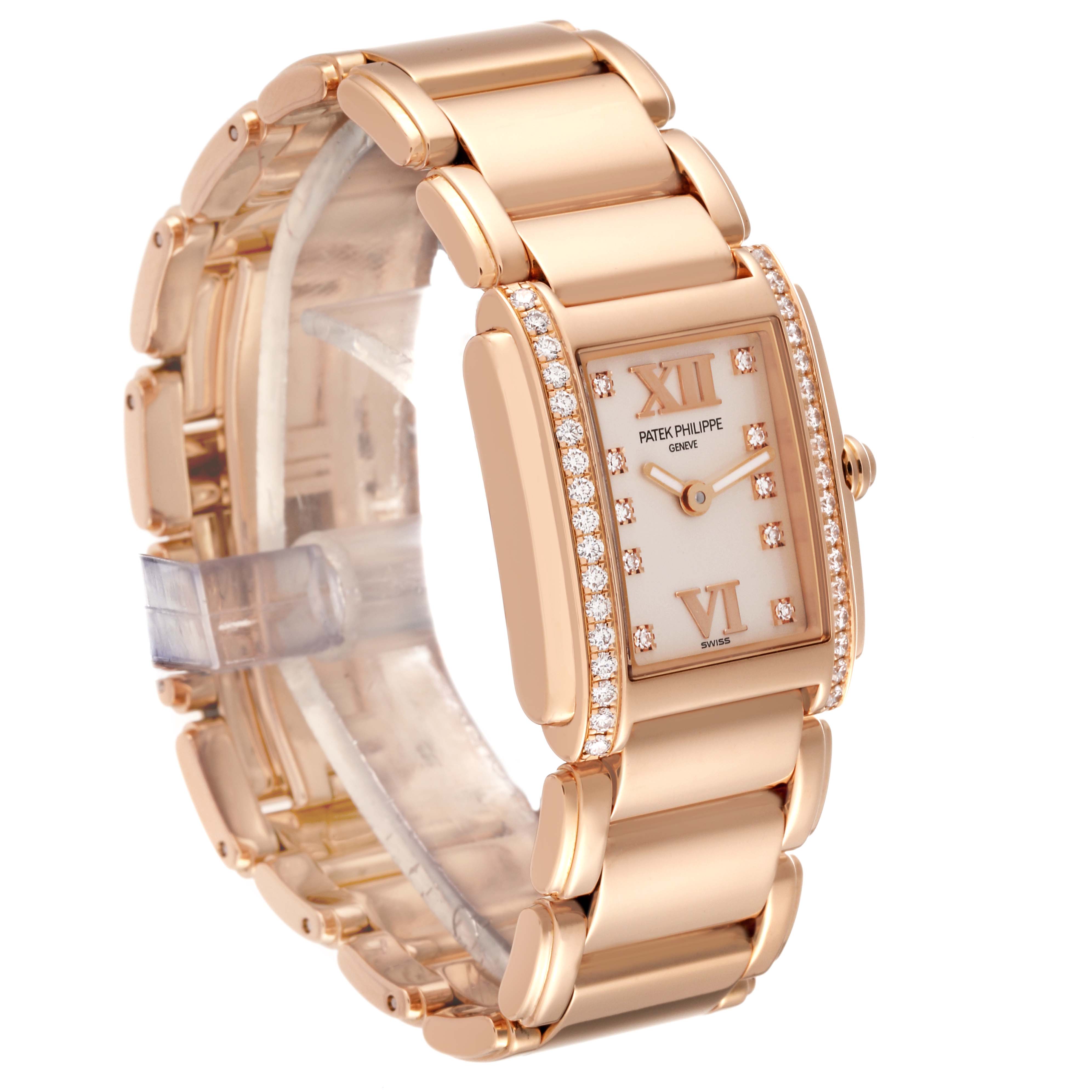 The Patek Philippe Twenty-4 4908/11R Women's Rose Gold Silver Dial 4908/11R Women's Rose Gold Silver Dial watch is shown at an angled view, highlighting its rose gold case, diamond-set bezel, and bracelet.