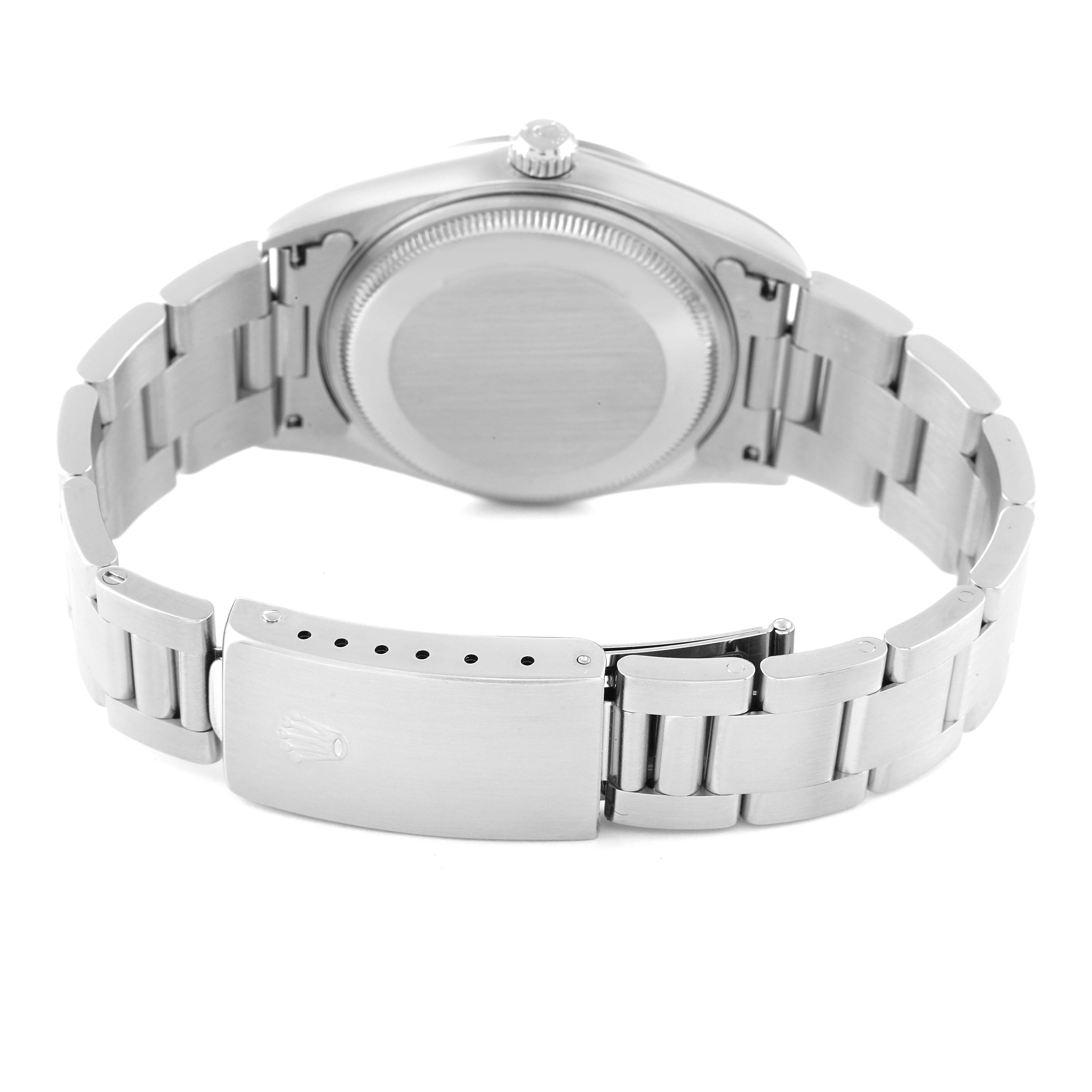 This image shows the back view of the Rolex Air-King 14000 Men's Stainless Steel Blue Dial 14000 Men's Stainless Steel Blue Dial watch, highlighting the case back, crown, and oyster bracelet with the clasp open.