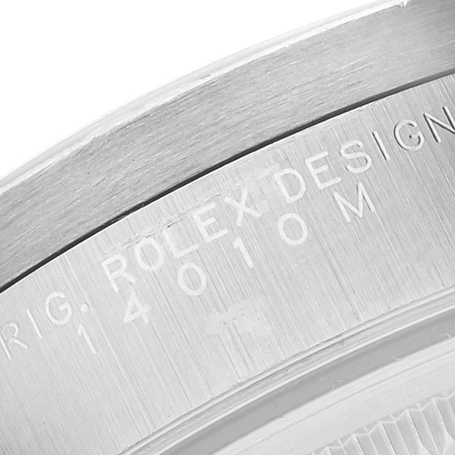 The image shows a close-up view of the caseback with engraved text on a Rolex Air-King 14010 Men's Stainless Steel Black Dial 14010 Men's Stainless Steel Black Dial watch.