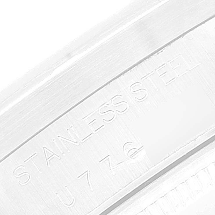 The image shows a close-up angle of the stainless steel band of a Rolex Air-King 14010 Men's Stainless Steel Silver Dial 14010 Men's Stainless Steel Silver Dial watch, highlighting the engraved text.