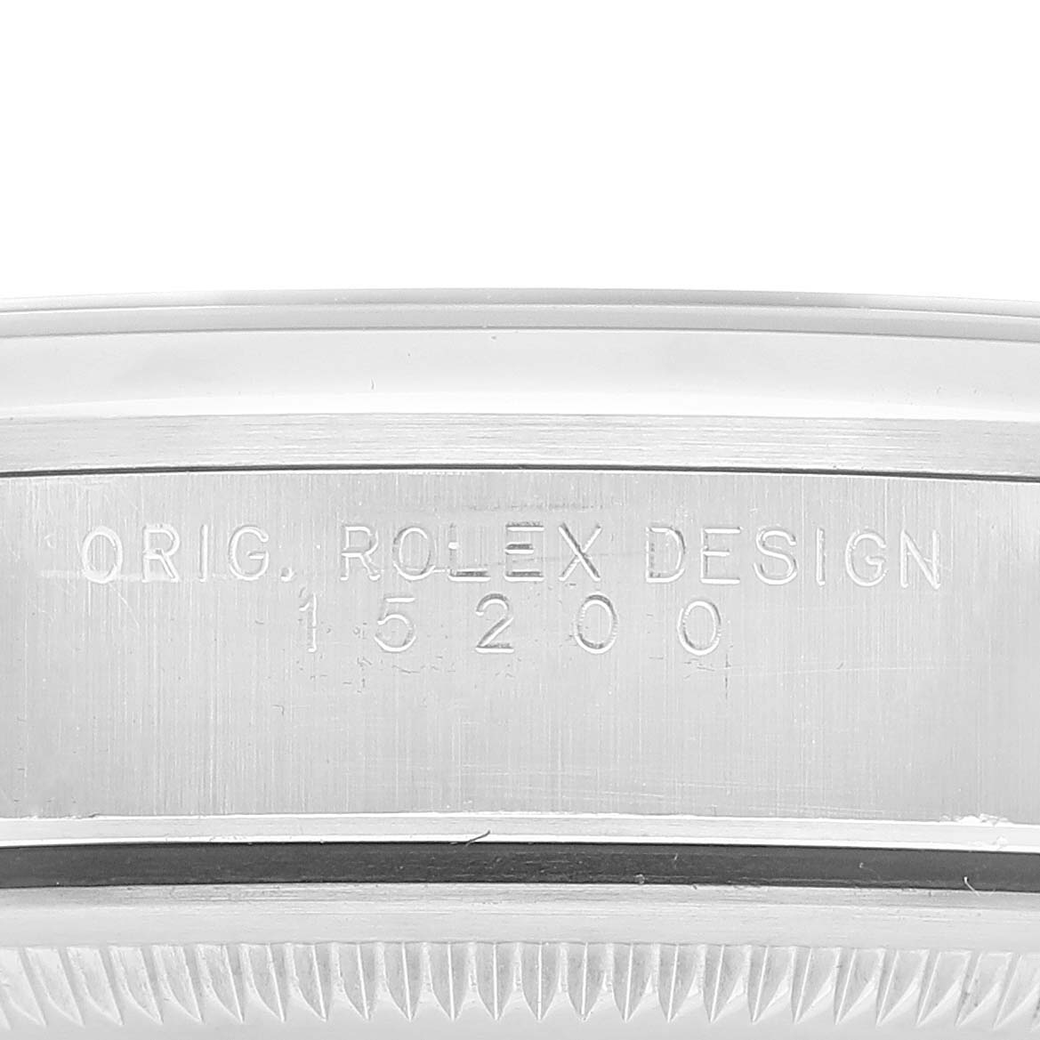 This image shows a close-up of the engraved case side of a Rolex Date 15200 Men's Stainless Steel Black Dial 15200 Men's Stainless Steel Black Dial model watch, labeled "ORIG. ROLEX DESIGN 15200."