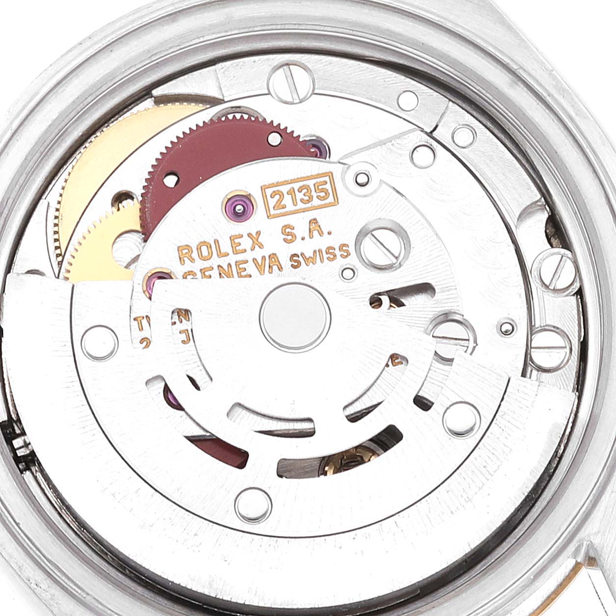 This image shows the internal mechanism of the Rolex Datejust 69173 Women's Steel and Gold (two tone) Champagne Dial 69173 Women's Steel and Gold (two tone) Champagne Dial watch, including gears and engraved text.