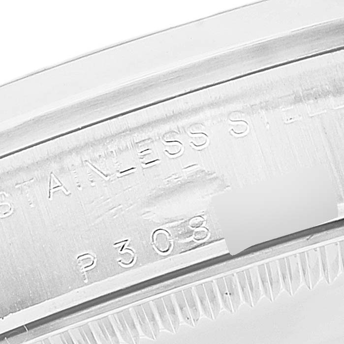 This is a close-up angle of the case back edge and engraving on a Rolex Mid-Size 78240 Women's Stainless Steel Black Dial 78240 Women's Stainless Steel Black Dial watch.