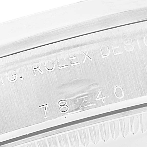 The image shows a close-up of the side profile, highlighting the model number engraved on a Mid-Size Rolex watch.