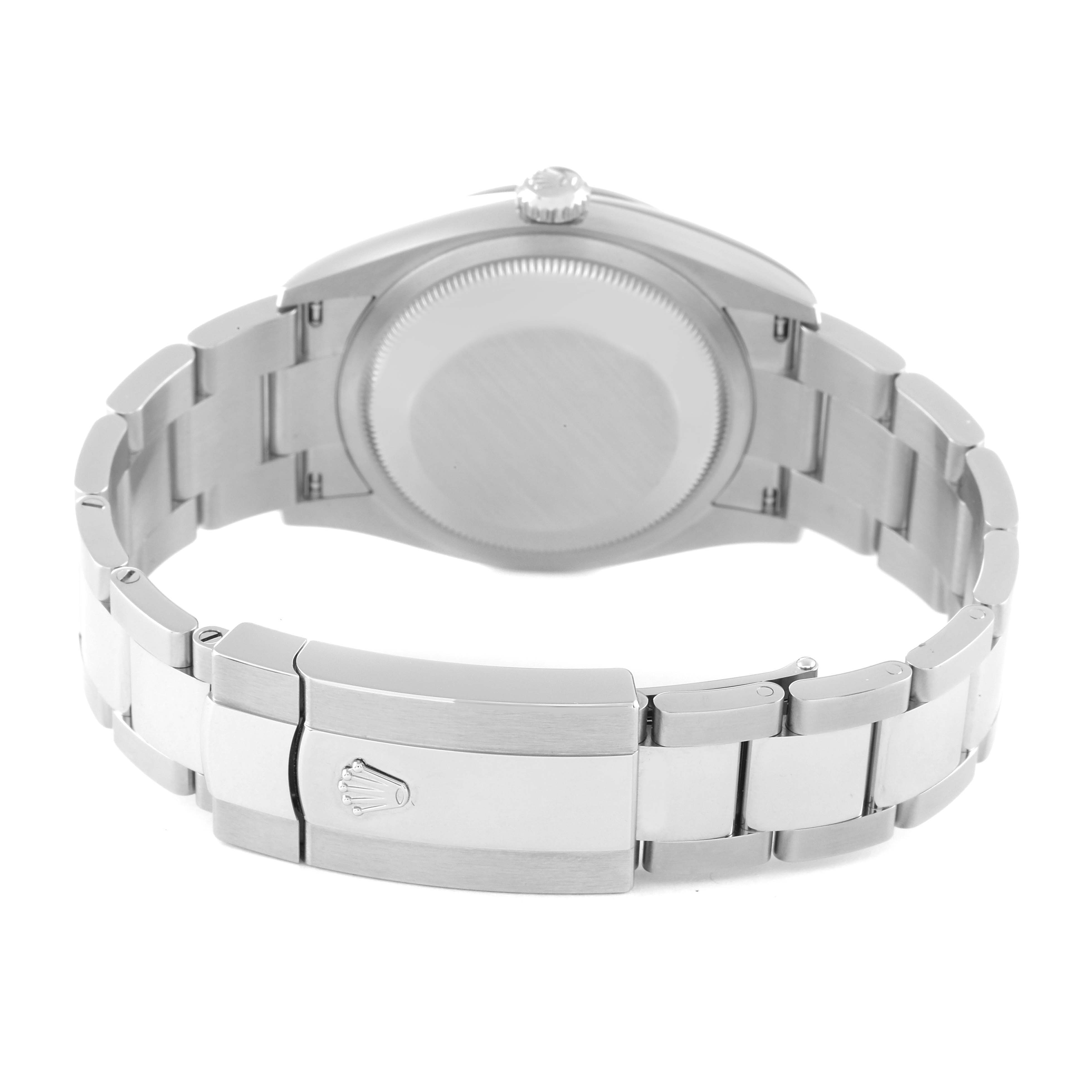 The image shows the back and clasp of a Rolex Datejust 126200 Men's Stainless Steel Grey Dial 126200 Men's Stainless Steel Grey Dial watch, highlighting its stainless steel bracelet and caseback.