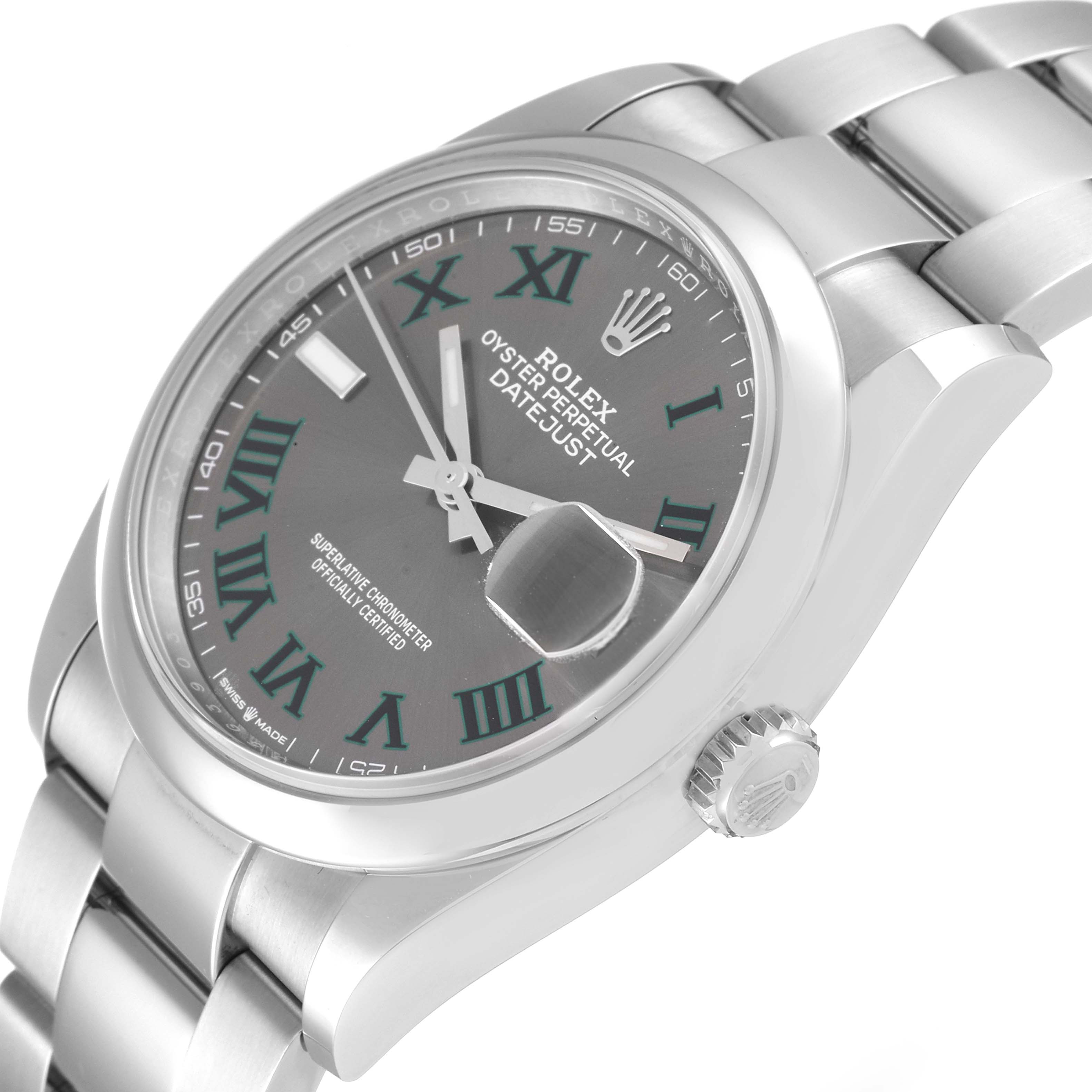 The image shows a close-up of the Rolex Datejust 126200 Men's Stainless Steel Grey Dial 126200 Men's Stainless Steel Grey Dial watch, highlighting the dial, bracelet, and crown from an angled perspective.
