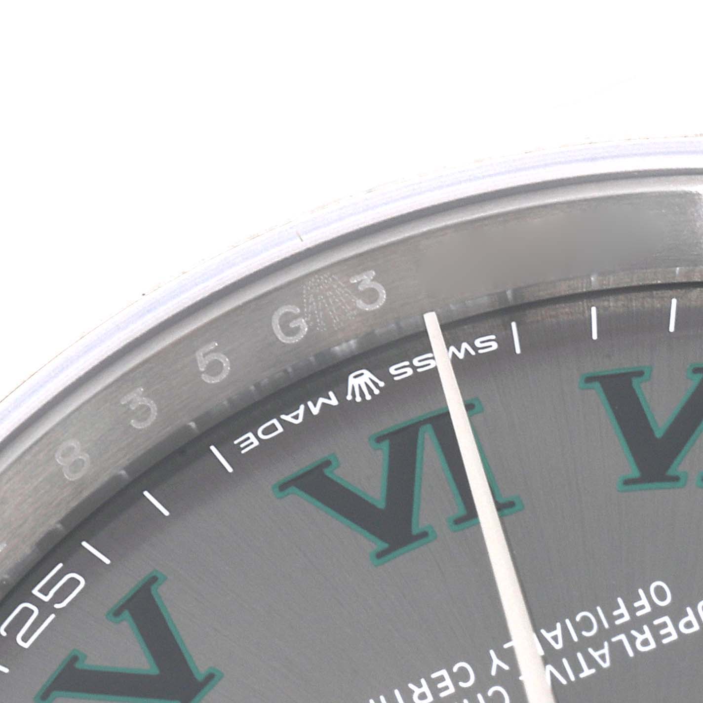 This image shows a close-up of the dial and inner bezel of the Rolex Datejust 126200 Men's Stainless Steel Grey Dial 126200 Men's Stainless Steel Grey Dial watch, focusing on the "SWISS MADE" text and Roman numerals.