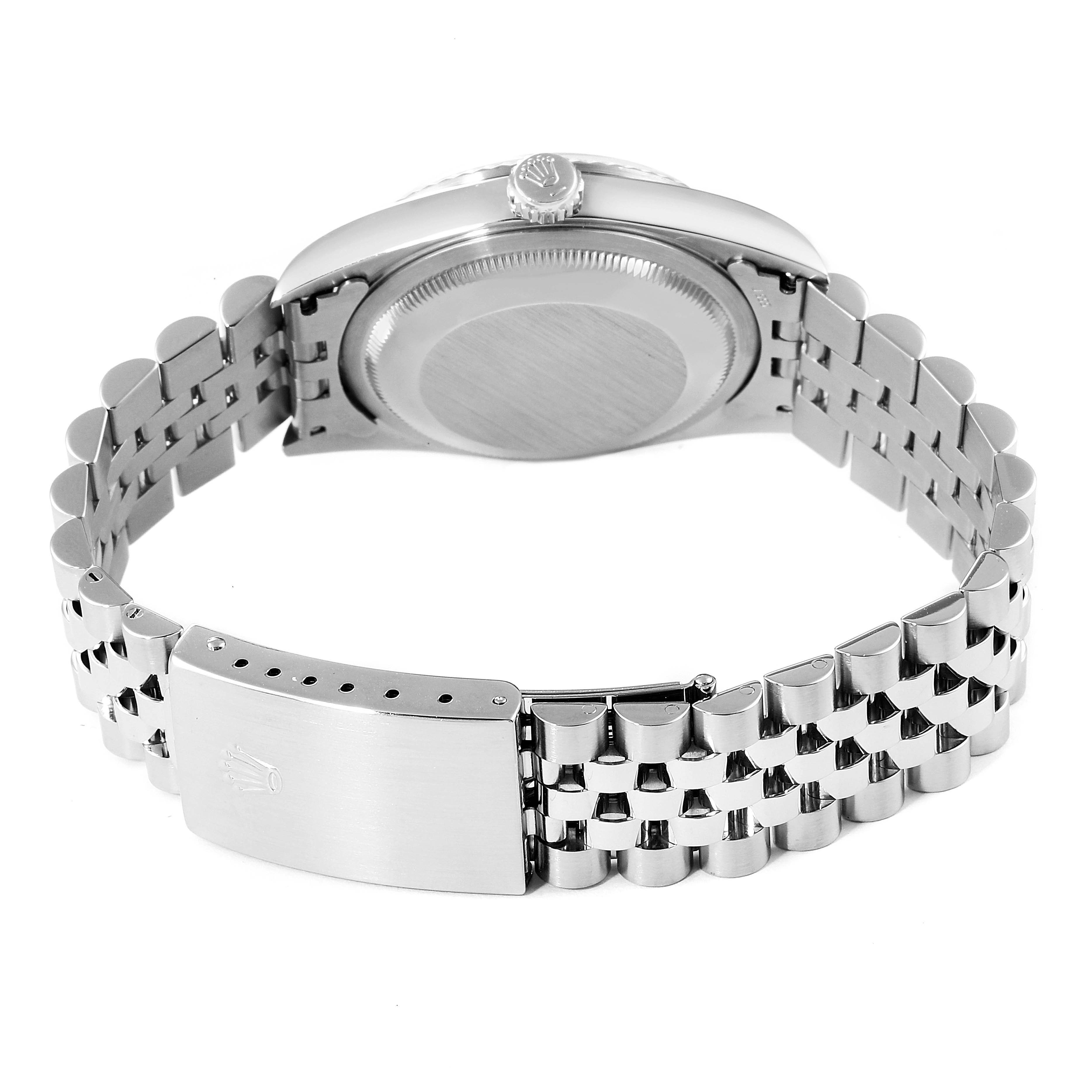 This image shows the backside of the Rolex Datejust 16234 Men
s Stainless Steel Pink Dial 16234 Men
s Stainless Steel Pink Dial watch, highlighting the case back and the bracelet with the clasp.