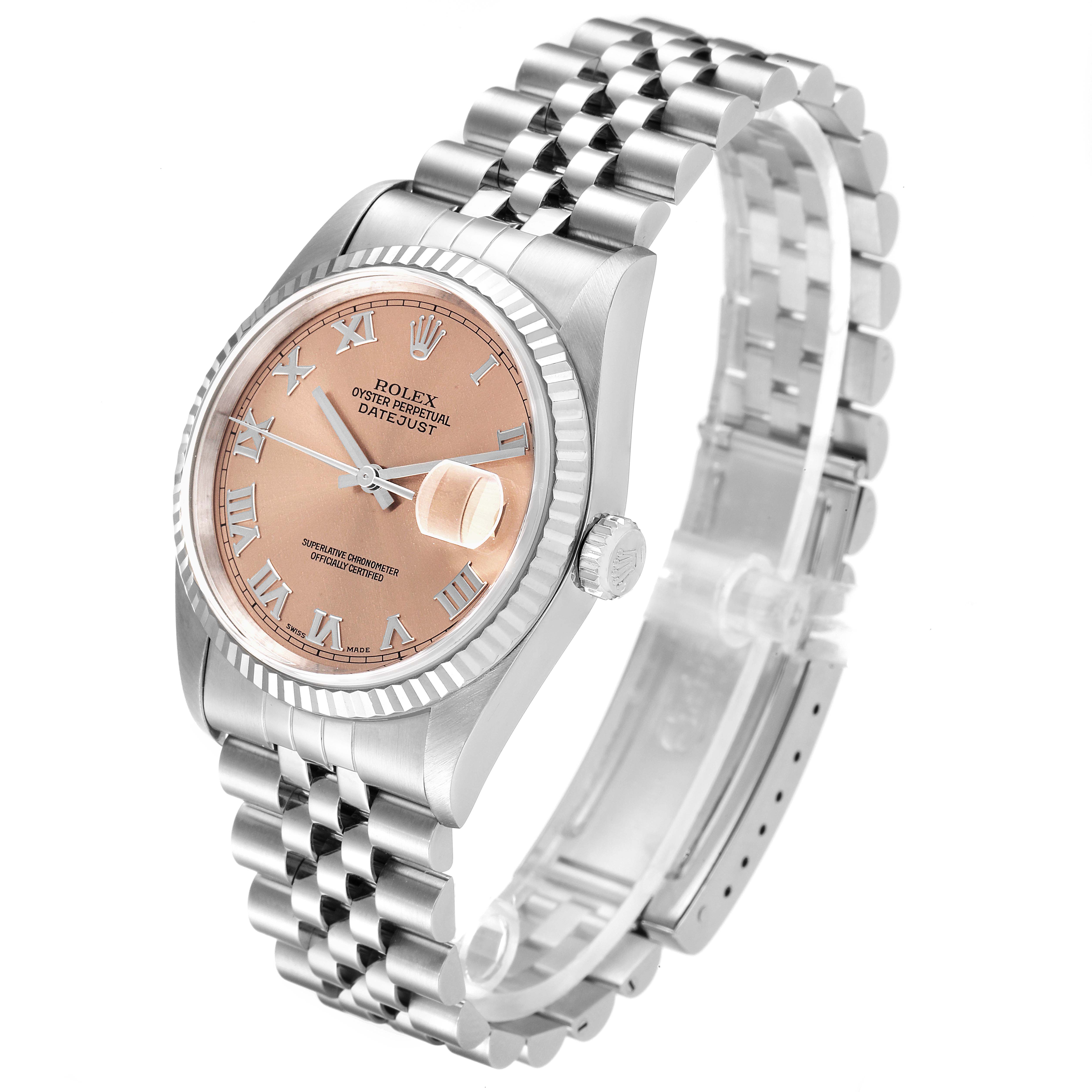 The image shows a Rolex Datejust 16234 Men
s Stainless Steel Pink Dial 16234 Men
s Stainless Steel Pink Dial watch at a slight angle, showcasing its face, bezel, crown, and jubilee bracelet.