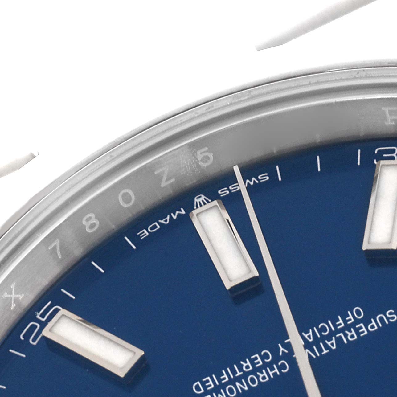 The image shows a close-up of the dial, markers, and part of the bezel of a Rolex Datejust 41 126300 Men's Stainless Steel Blue Dial 126300 Men's Stainless Steel Blue Dial watch.