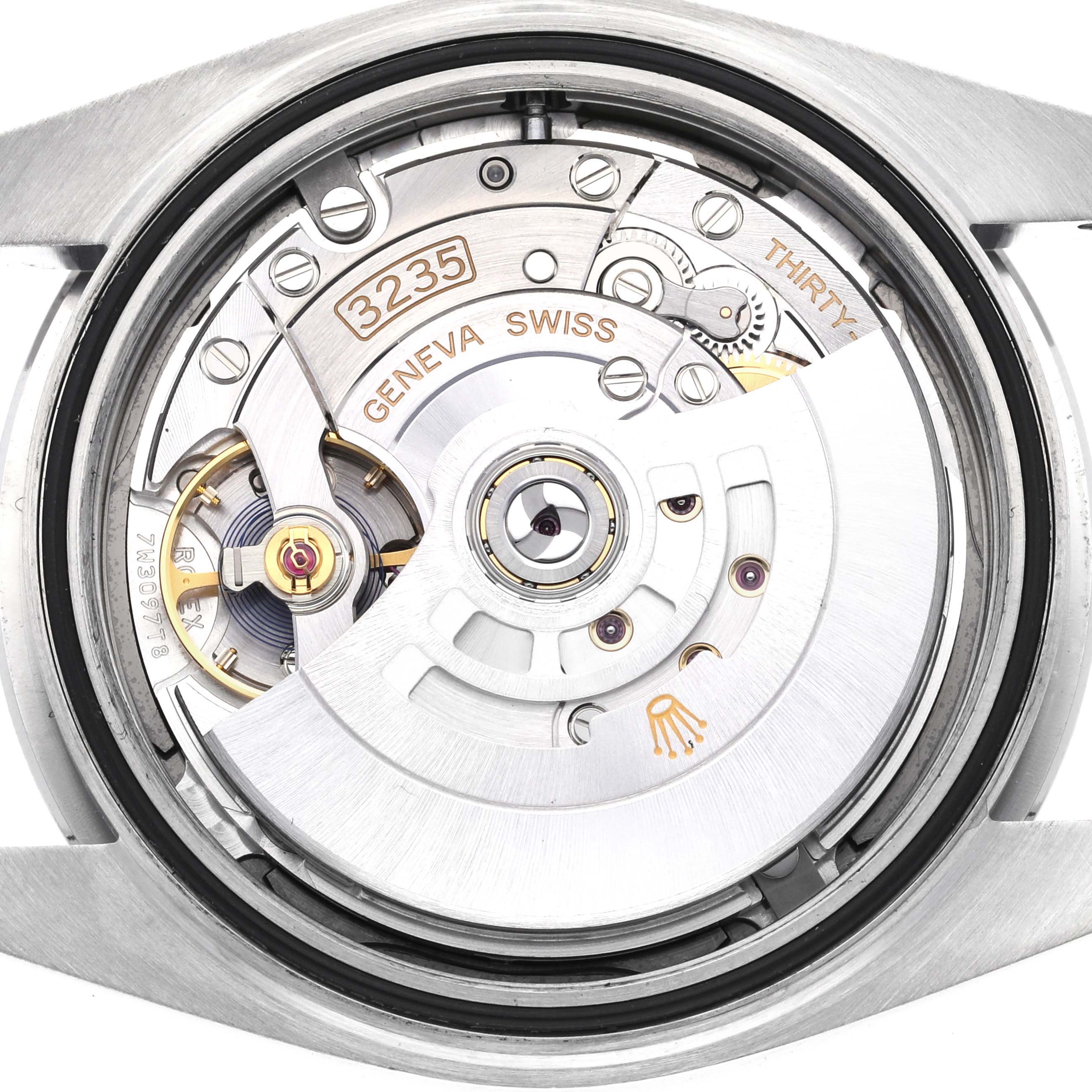 The image shows the movement and internal components of the Rolex Datejust 41 126300 Men's Stainless Steel Blue Dial 126300 Men's Stainless Steel Blue Dial from a back view.