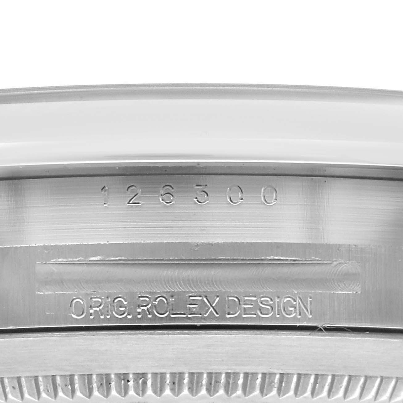 The image shows the side of a Rolex Datejust 41 126300 Men's Stainless Steel Blue Dial 126300 Men's Stainless Steel Blue Dial, highlighting the model number and design engraving.