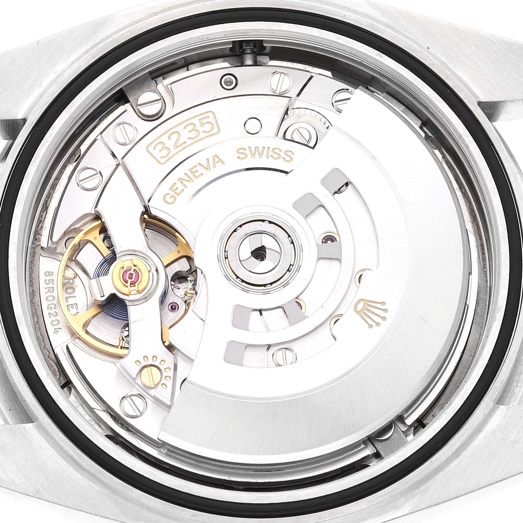 The image shows the internal mechanism and rotor of a Rolex Datejust 41 126300 Men's Stainless Steel Grey Dial 126300 Men's Stainless Steel Grey Dial watch, displaying its intricate movement components.