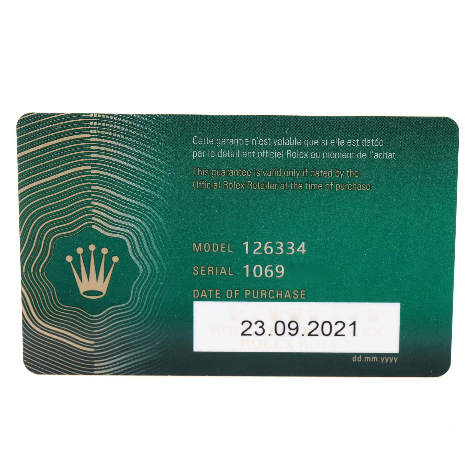 This image shows a warranty card for a Rolex Datejust 41 126334 Men
s Stainless Steel Silver Dial 126334 Men
s Stainless Steel Silver Dial model, featuring model and serial numbers, and the date of purchase.