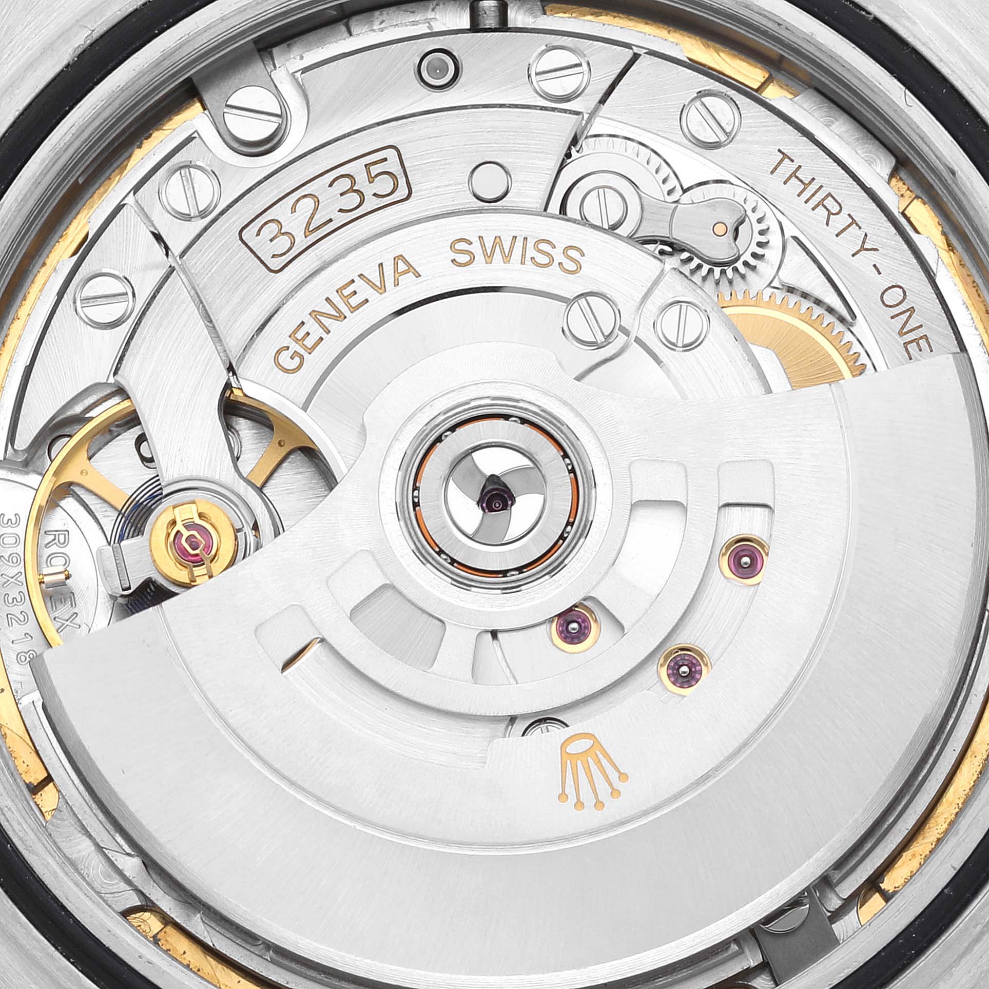 This image shows a close-up view of the movement mechanism inside a Rolex Datejust 41 126333 Men's Steel and Gold (two tone) White Dial 126333 Men's Steel and Gold (two tone) White Dial watch, featuring the 3235 caliber.