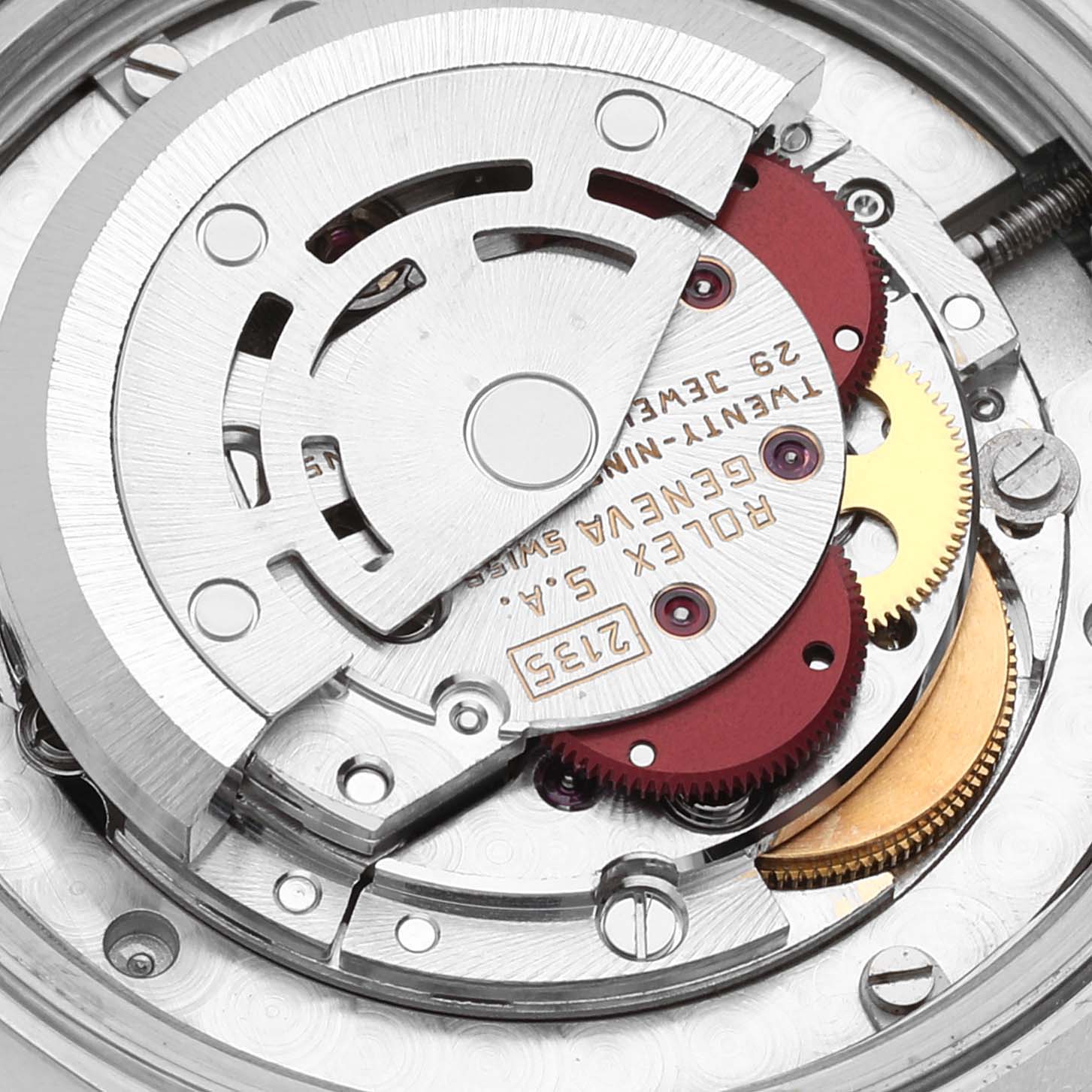 This image shows a close-up view of the internal movement parts of a Rolex Mid-Size 68274 Women's Stainless Steel Silver Dial 68274 Women's Stainless Steel Silver Dial model watch.