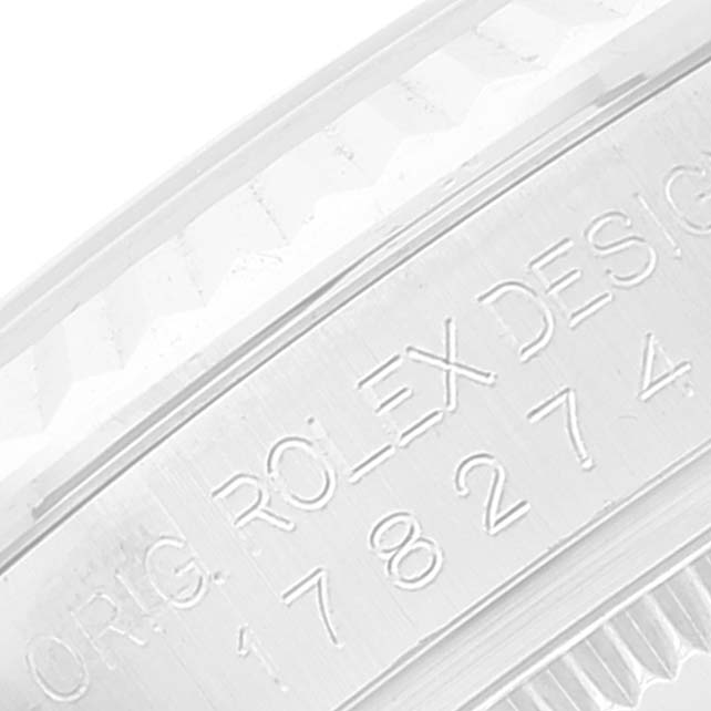 This is a close-up angle of the side of a Mid-Size Rolex watch, showing the engraved model number and branding.