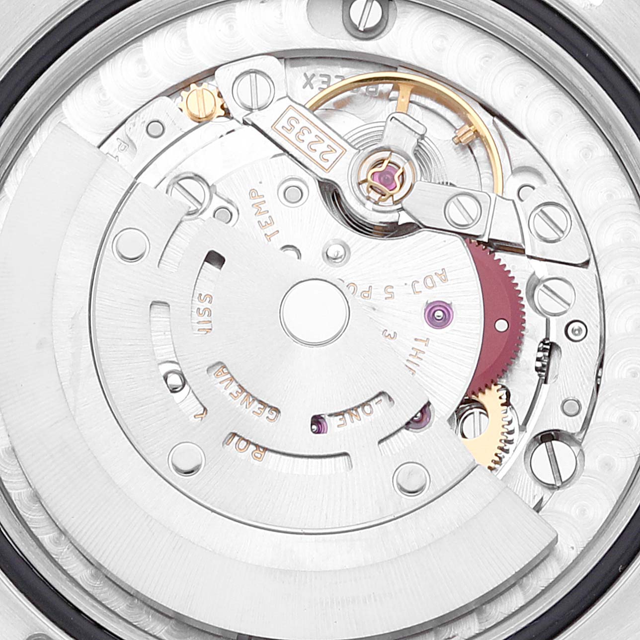 This image shows the intricate internal mechanics of a Mid-Size Rolex watch, viewed from the back.