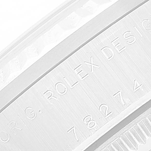 This is a close-up angle of the serial number and engravings on the side of a Rolex Mid-Size 78274 Women
s Stainless Steel Pink Dial 78274 Women
s Stainless Steel Pink Dial watch case.