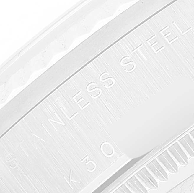 This image shows a close-up of the side of a Rolex Mid-Size 78274 Women
s Stainless Steel Pink Dial 78274 Women
s Stainless Steel Pink Dial watch, focusing on the "STAINLESS STEEL" engraving.