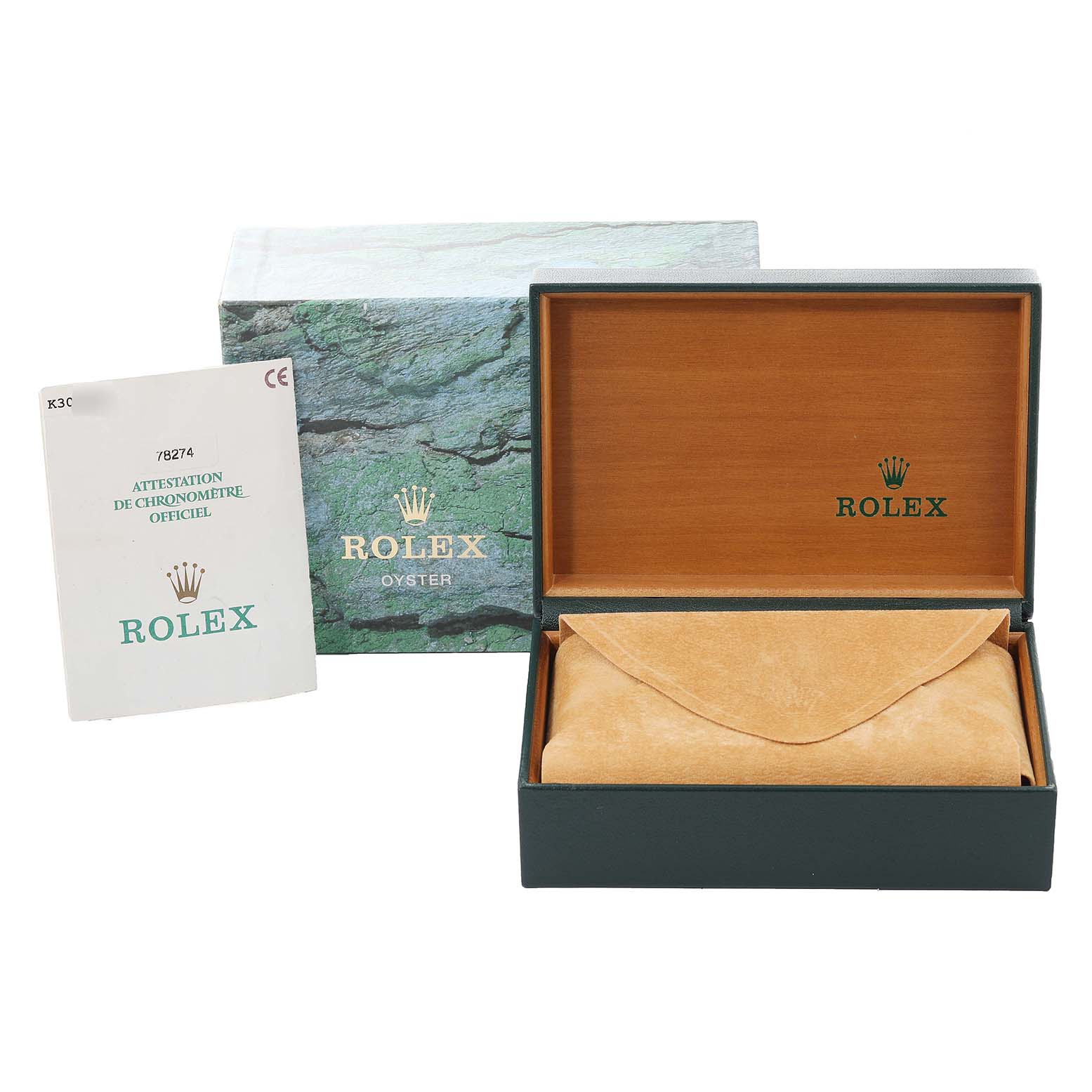 The image shows the packaging, inner and outer boxes, and documentation for a mid-size Rolex watch.