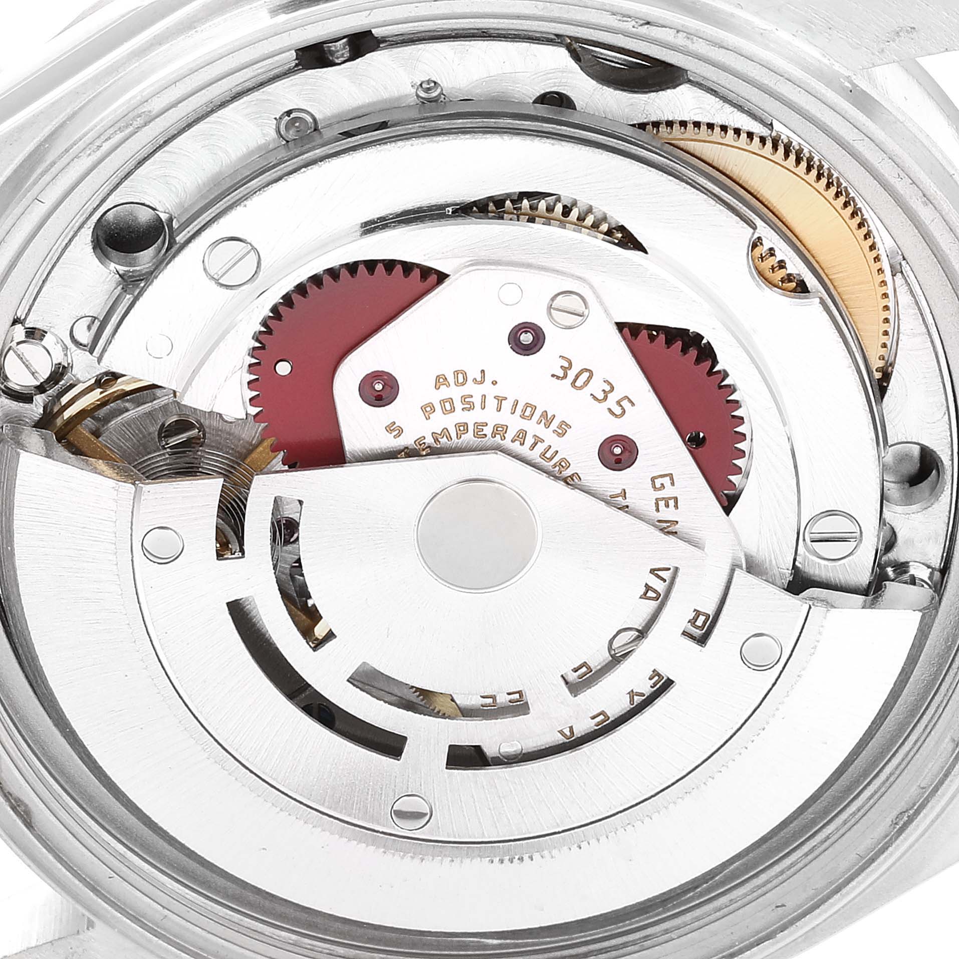 The image shows an up-close view of the Rolex Vintage Collection 16030 Men's Stainless Steel Silver Dial 16030 Men's Stainless Steel Silver Dial watch's internal movement mechanism, showcasing gears and components.