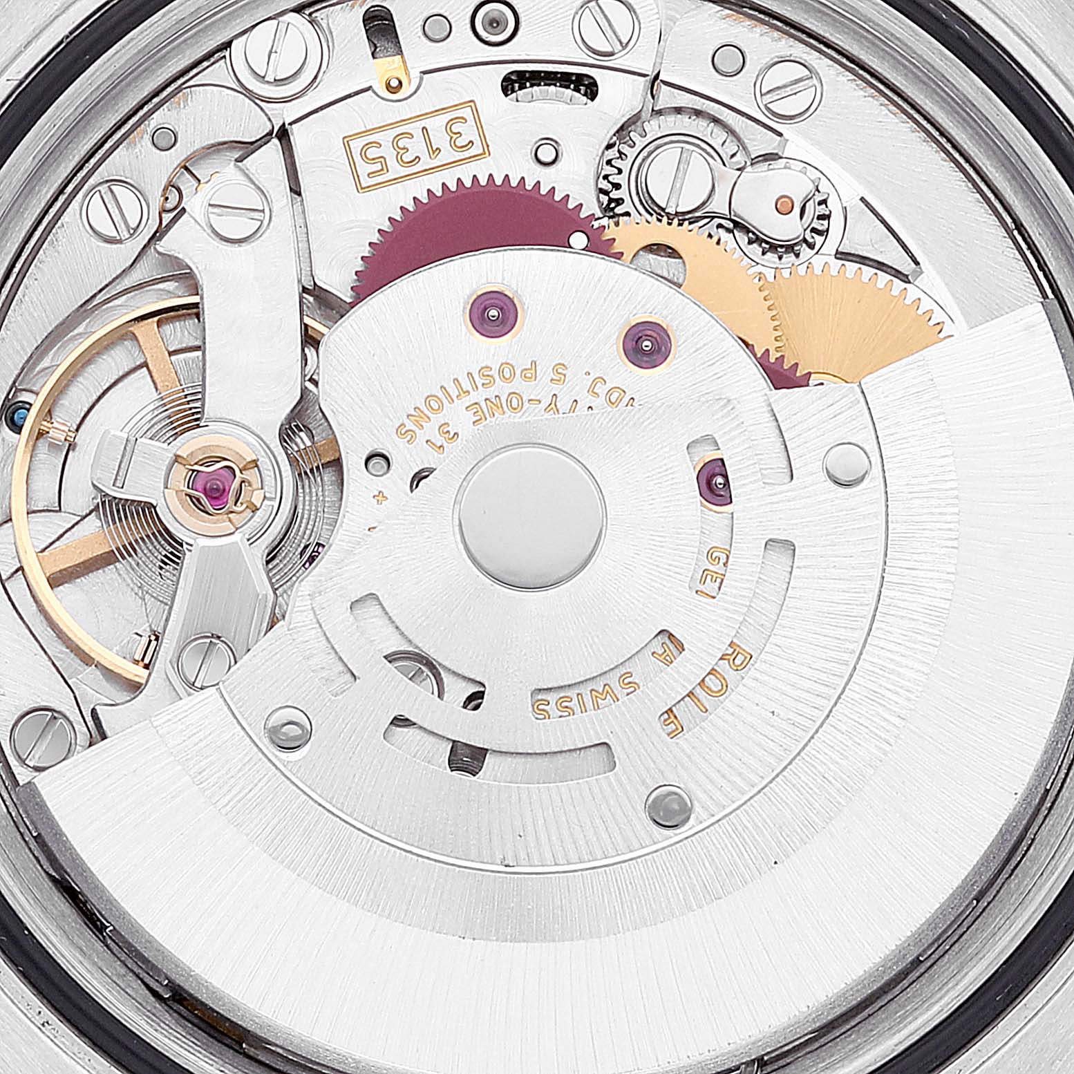 The image shows an internal view of the movement mechanism of a Rolex Datejust 116234 Men's Stainless Steel Blue Dial 116234 Men's Stainless Steel Blue Dial watch, featuring gears and rotors.