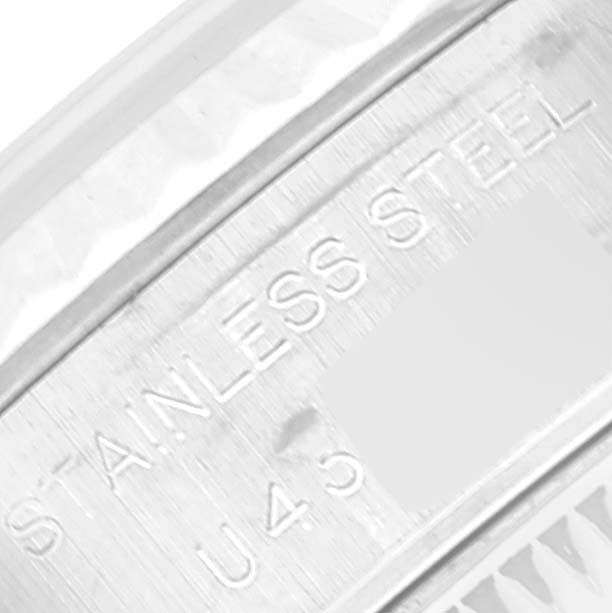 This is a close-up of the stainless steel engraving on the inner bezel of a Rolex Datejust 69174 Women's Stainless Steel Silver Dial 69174 Women's Stainless Steel Silver Dial watch.