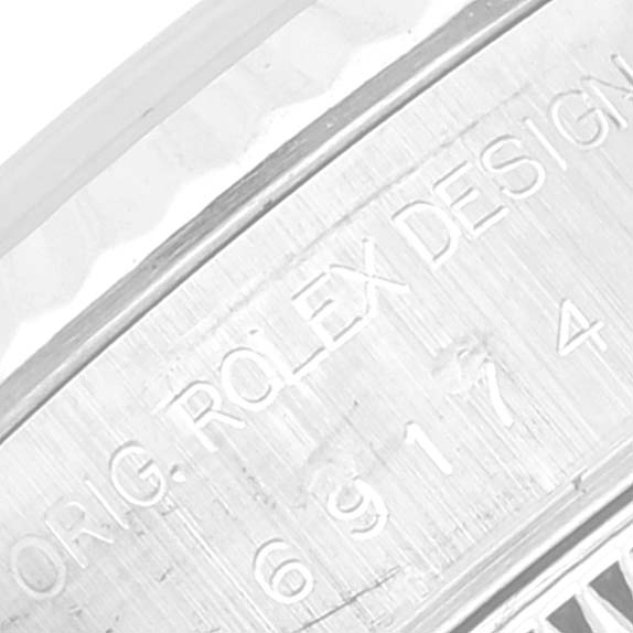 This image shows a close-up of the inner bezel and engraving on a Rolex Datejust 69174 Women's Stainless Steel Silver Dial 69174 Women's Stainless Steel Silver Dial watch case.