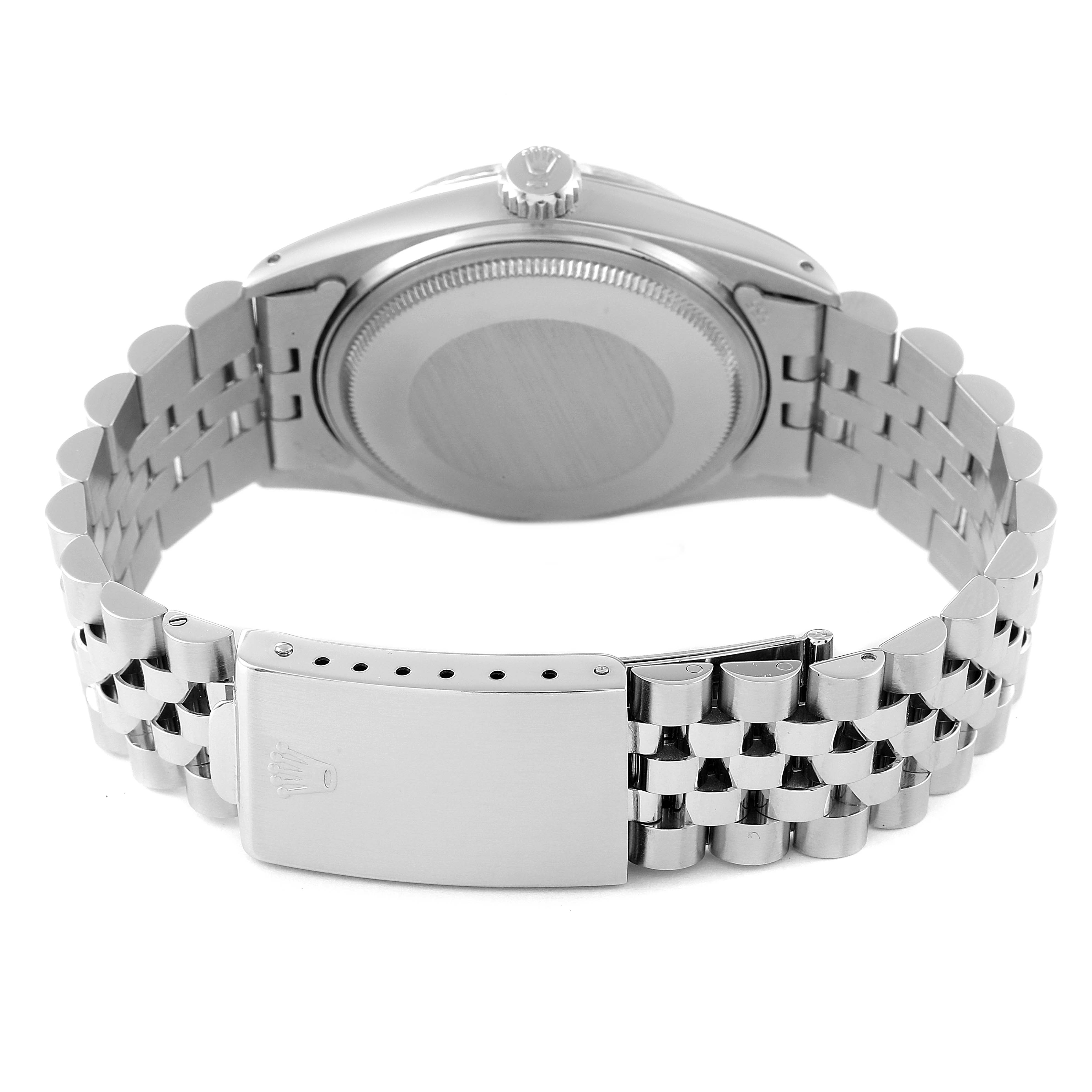 The image shows the back of the Vintage Collection Rolex watch, highlighting the clasp, bracelet, and the back case.