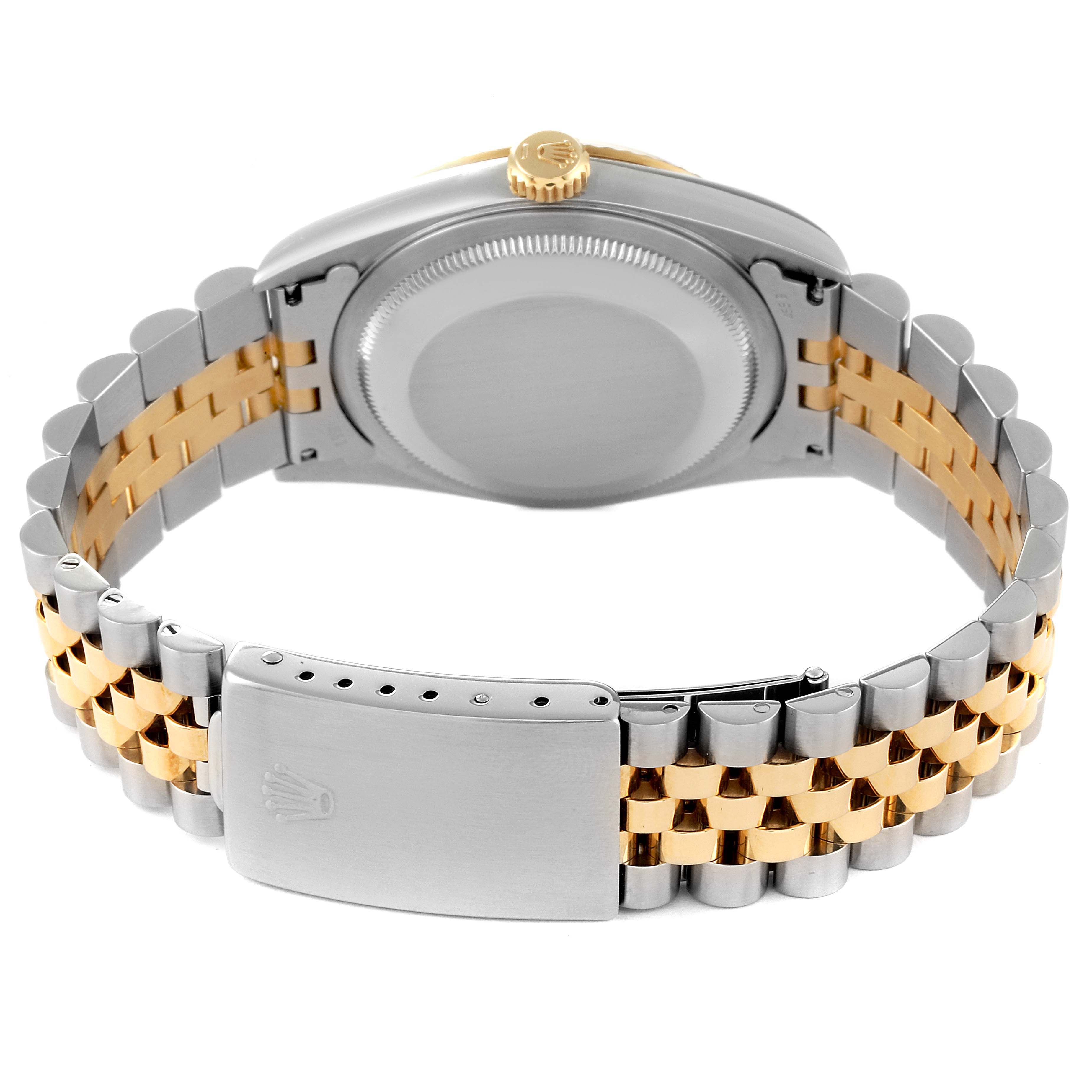 This image shows the back case and bracelet of a Rolex Datejust 16233 Men's Steel and Gold (two tone) Black Dial 16233 Men's Steel and Gold (two tone) Black Dial watch, with a two-tone metal design.