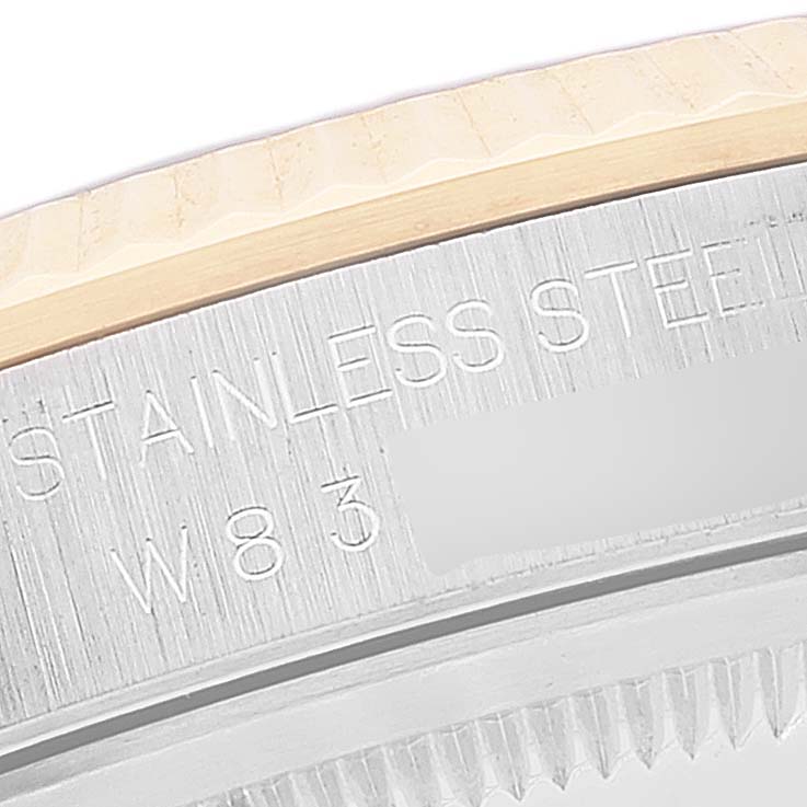 This close-up image of the Rolex Datejust 16233 Men's Steel and Gold (two tone) Black Dial 16233 Men's Steel and Gold (two tone) Black Dial watch shows the stainless steel engraving on the caseback rim.