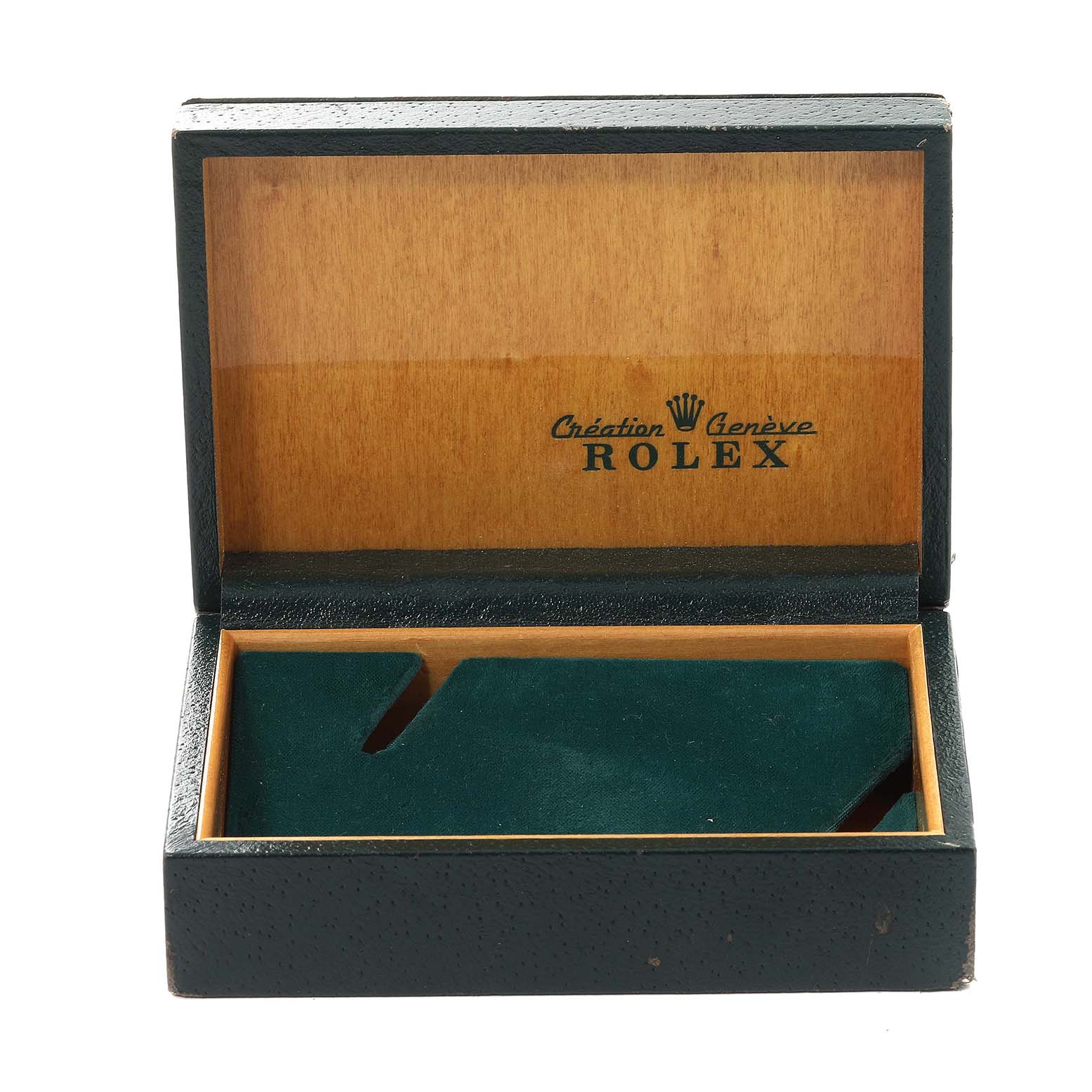 The image shows an open Rolex Vintage Collection 16013 Men's Steel and Gold (two tone) Champagne Dial 16013 Men's Steel and Gold (two tone) Champagne Dial watch box, highlighting its interior with wood and green velvet lining.