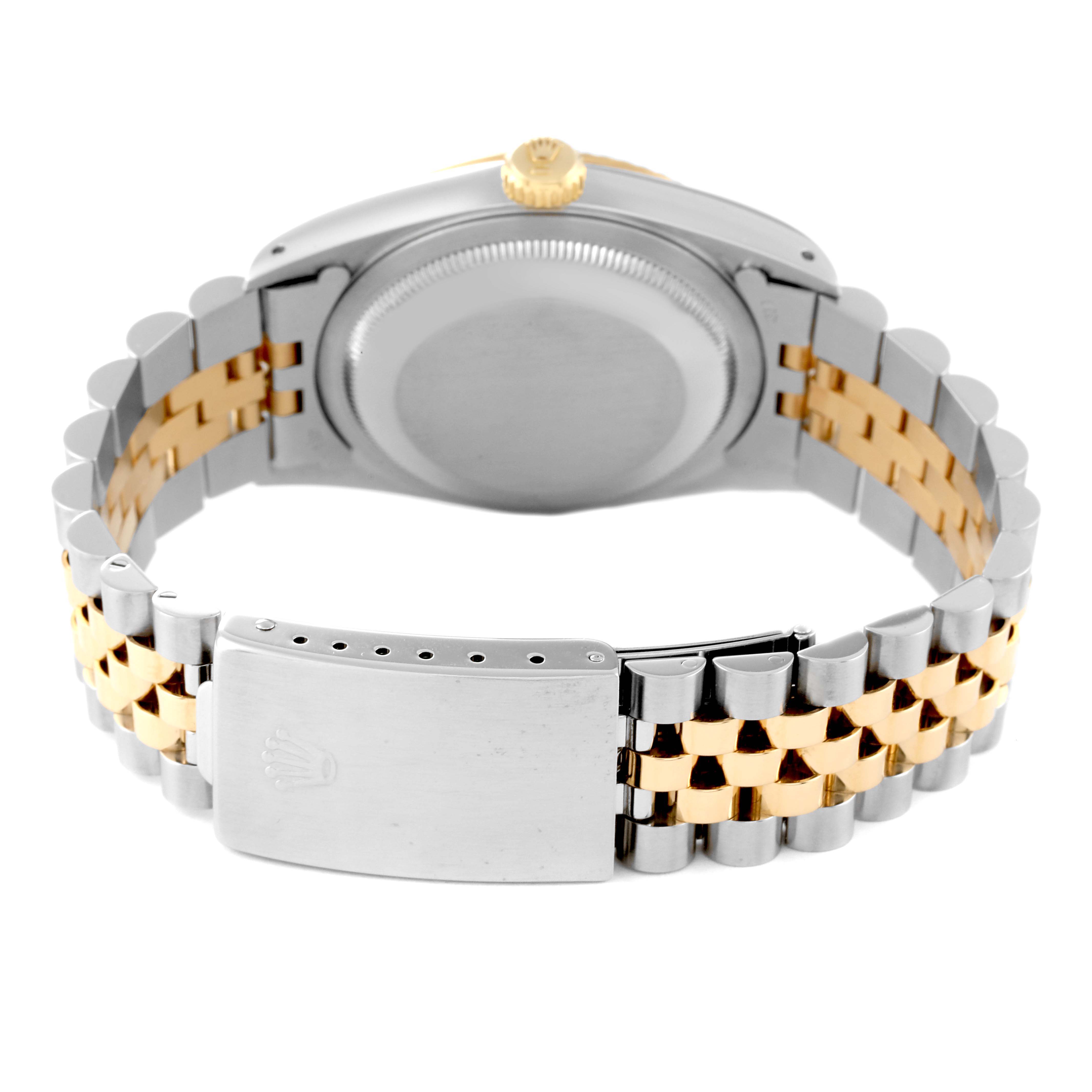 The image shows the back of a Rolex Datejust 16233 Men's Steel and Gold (two tone) Champagne Dial 16233 Men's Steel and Gold (two tone) Champagne Dial watch, highlighting the bi-metal bracelet and the clasp.