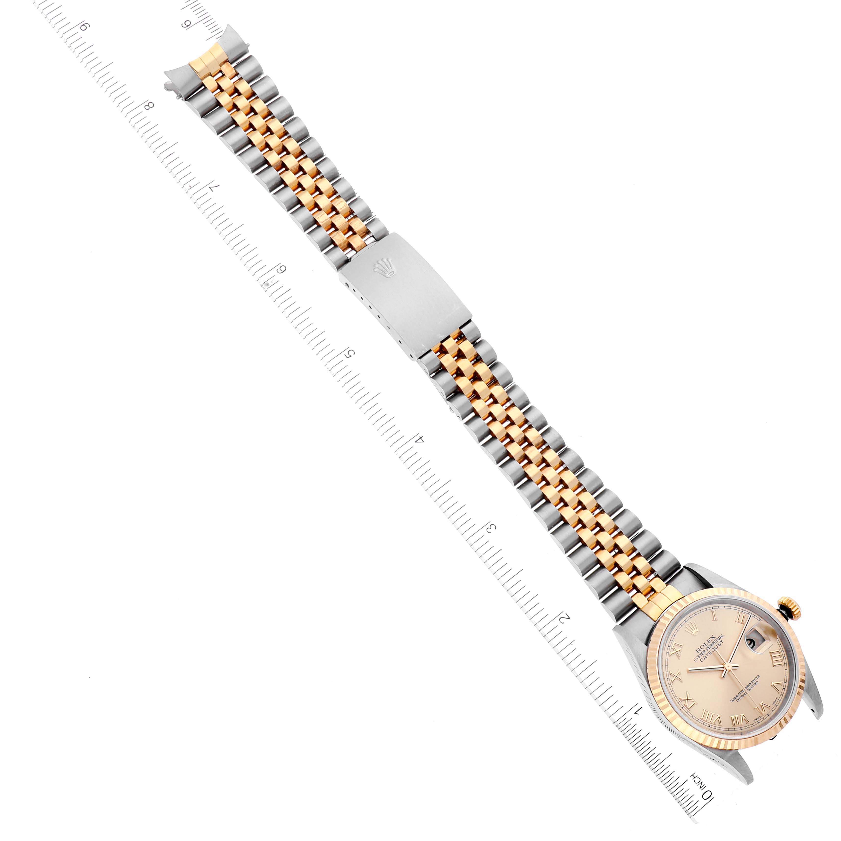The image shows a Rolex Datejust 16233 Men's Steel and Gold (two tone) Champagne Dial 16233 Men's Steel and Gold (two tone) Champagne Dial watch from a top angle, highlighting the face, bezel, crown, and two-tone bracelet with a clasp.