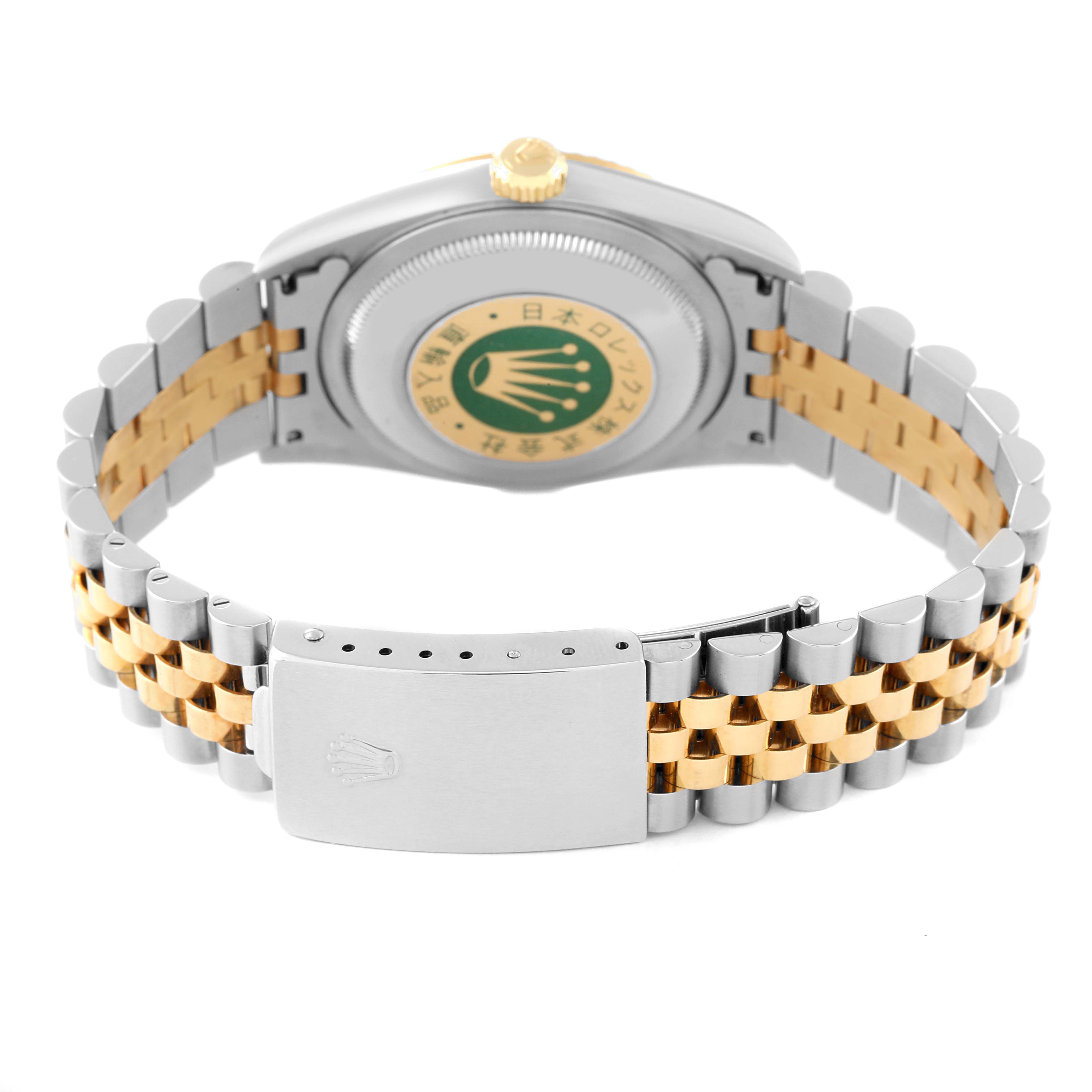 The image shows the back and bracelet of a Rolex Datejust 16233 Men's Steel and Gold (two tone) Champagne Dial 16233 Men's Steel and Gold (two tone) Champagne Dial watch, highlighting its two-tone metal design and clasp.