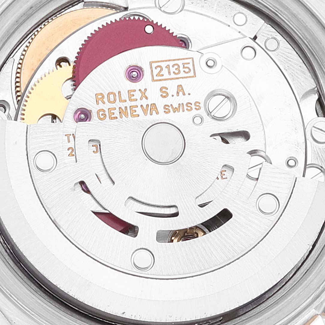 This image shows a close-up view of the movement mechanism of a Rolex Datejust 69163 Women's Steel and Gold (two tone) Silver Dial 69163 Women's Steel and Gold (two tone) Silver Dial watch.