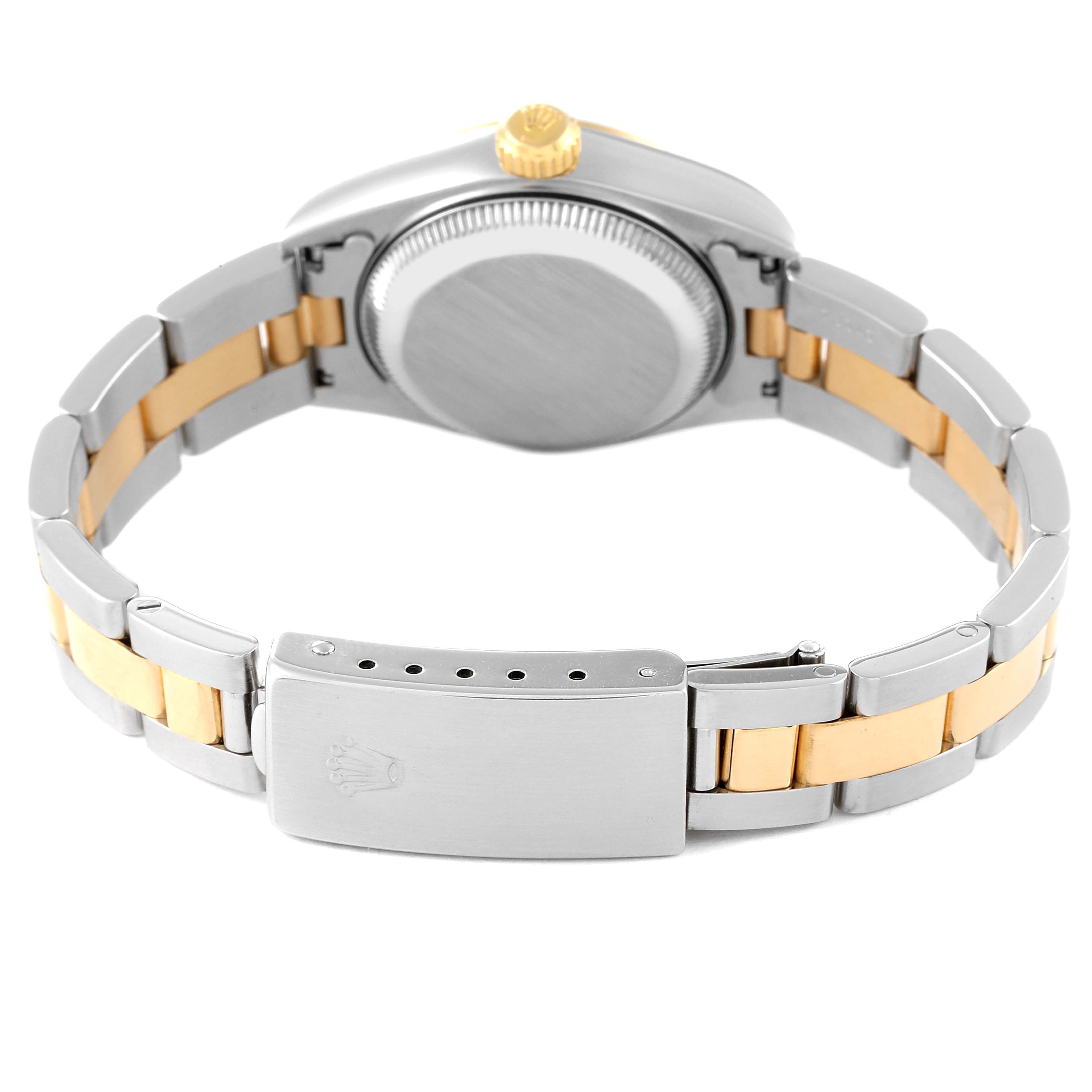 The image shows the back view of a Rolex Datejust 69163 Women's Steel and Gold (two tone) Silver Dial 69163 Women's Steel and Gold (two tone) Silver Dial watch focusing on the case, crown, and two-tone bracelet with clasp.